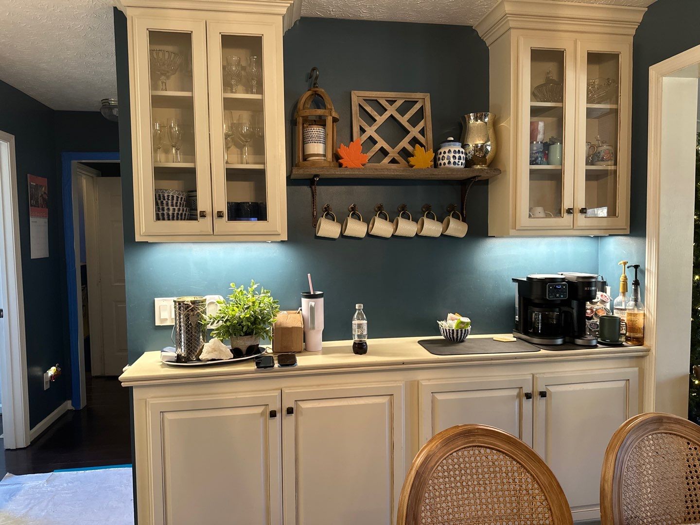 Modern Kitchen Remodel Featuring Quartz Backsplash, under cabinet lighintg, and a coffee bar in Mt. Juliet Tennessee by DeRo Renovations,LLC