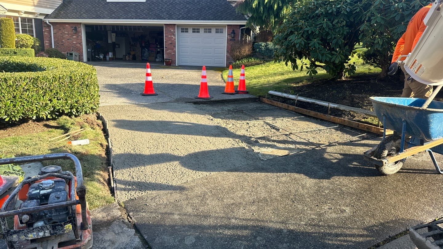 Concrete Driveway Patch Repair & Sealer | Mukilteo  by Jireh Asphalt & Concrete Inc 