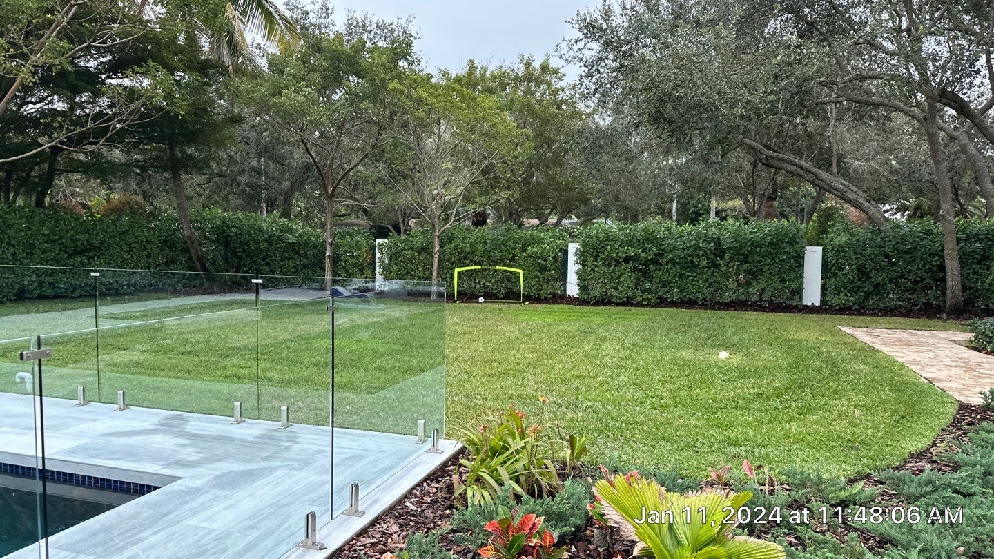 Backyard Landscape Renovation by Nature's Dream Landscape and Tree Service