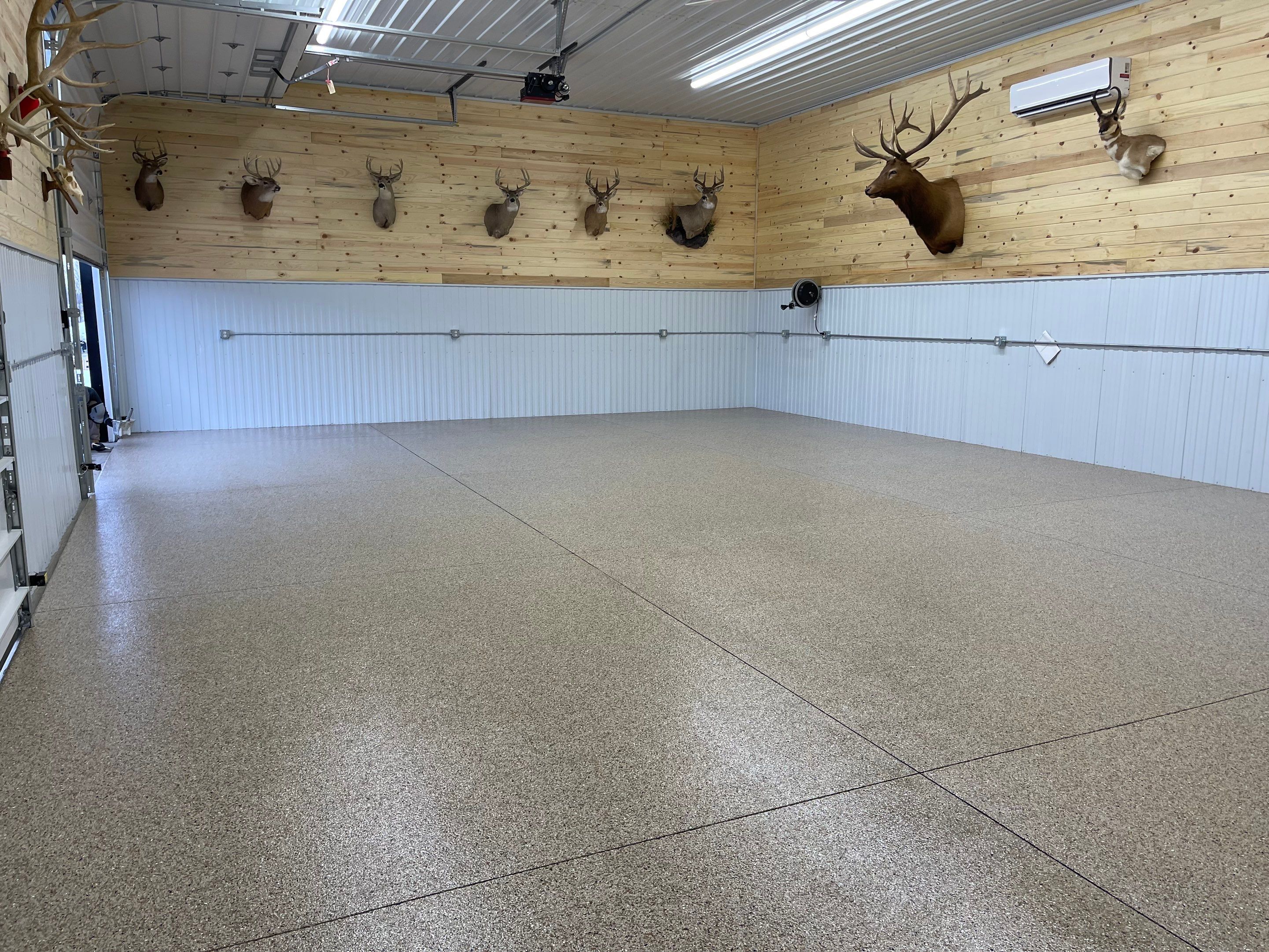 Garage using Pecan by Select Painting, Coatings & Garage Cabinets