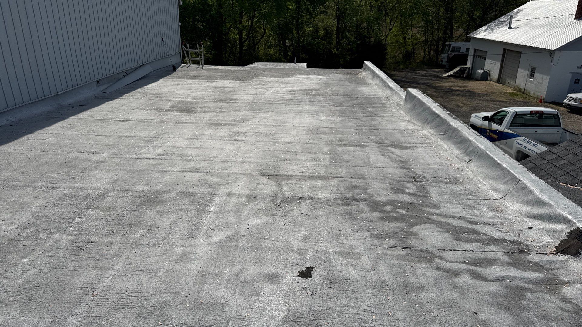 Roof Installation using Silicone APP Elevate Coating by ExteriorPros