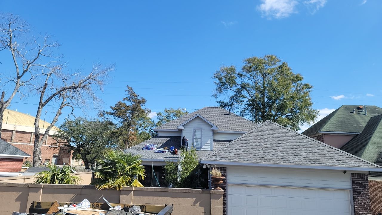 Residential Roofing Installation using Roof Replacement by American Roofing & Construction LLC
