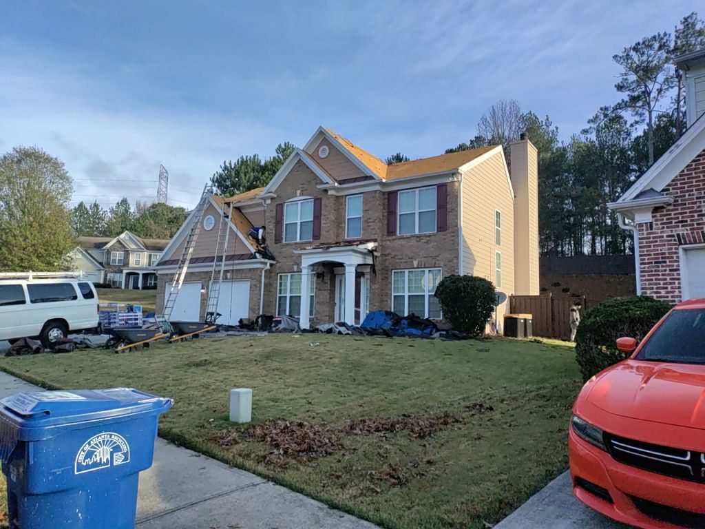 Residential Roofing Installation using Timberline HDZ Hickory  by Inspector Roofing and Restoration