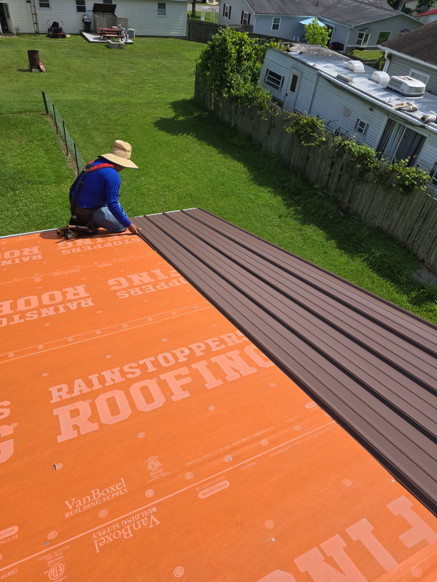 Residential Roofing Installation using Metal by Rainstoppers Roofing