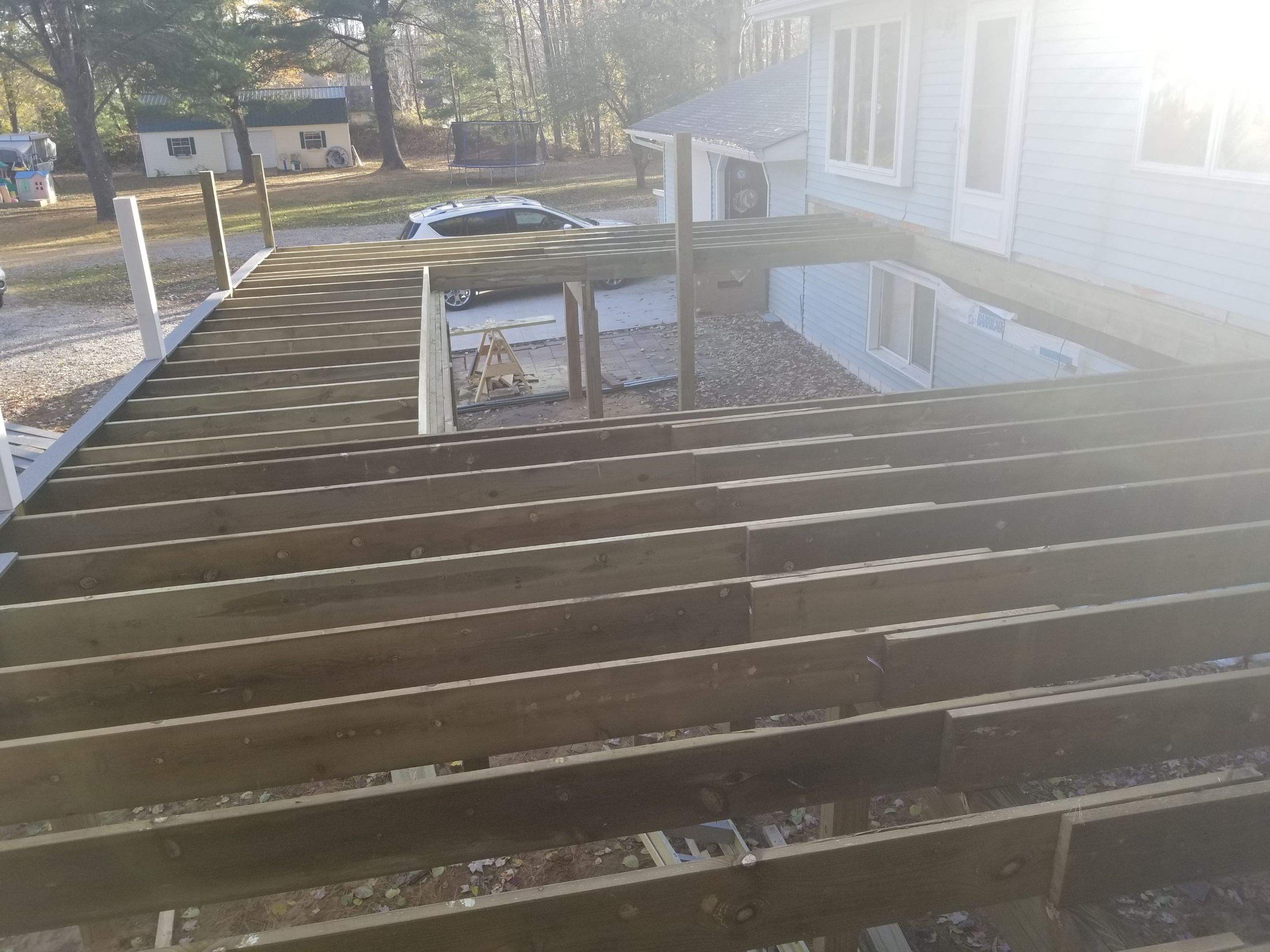 Sunroom and deck addition. by Energy Plus Home Improvements