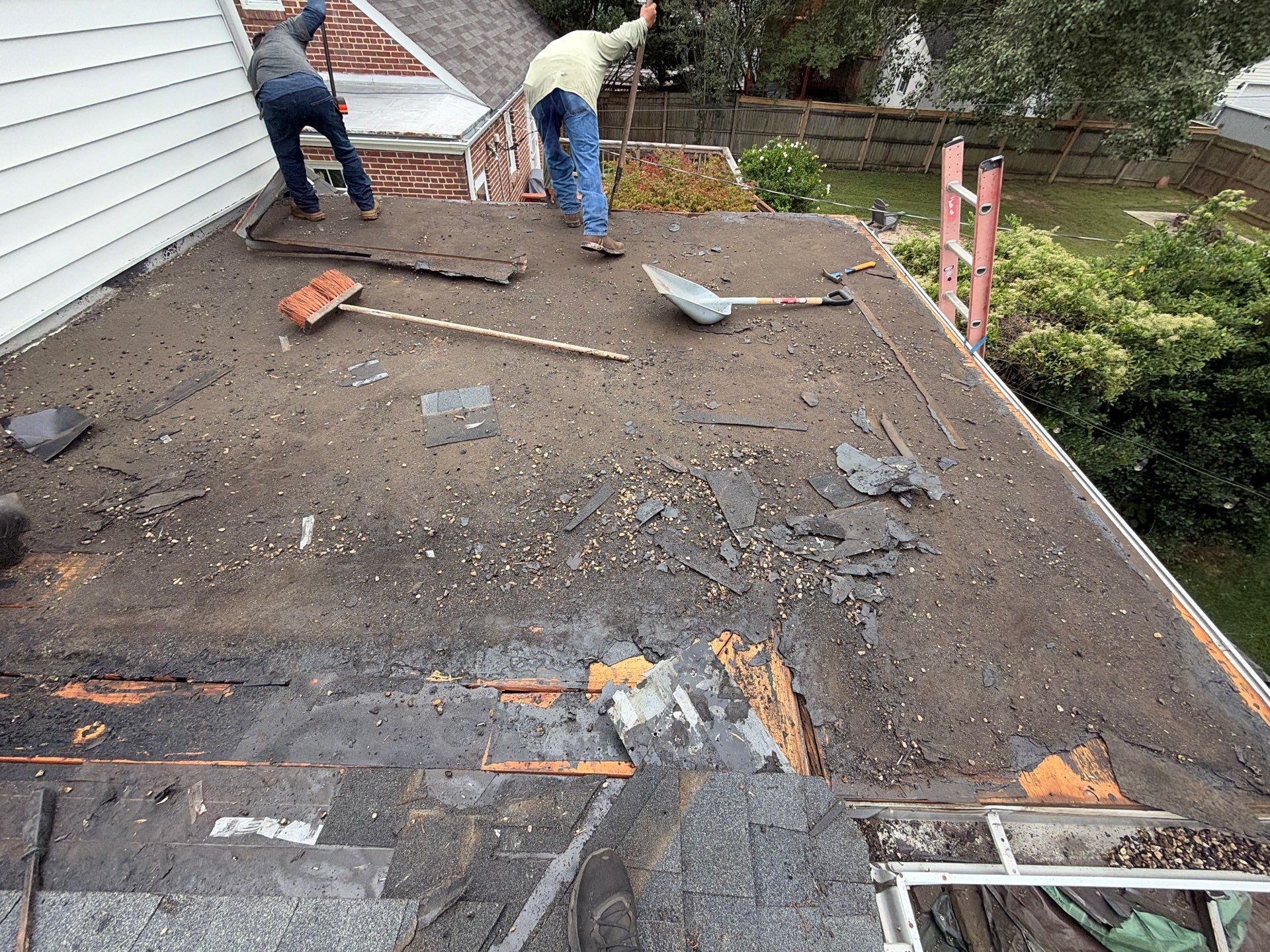 Richmond Roof Replacement Including Flat Membrane and Asphalt Shingles by Cade Construction