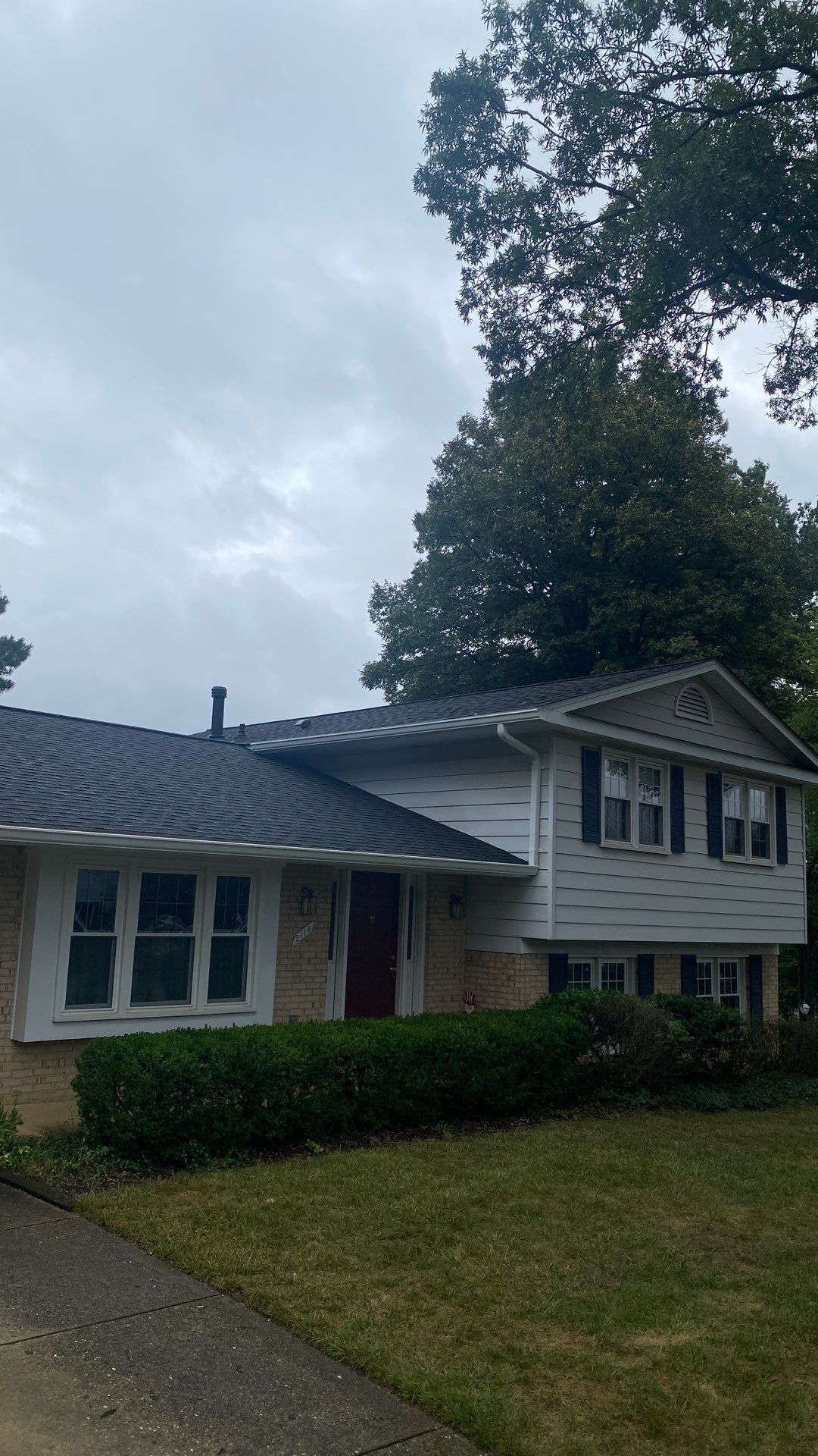 Vienna: Multi-Trade Restoration with CertainTeed Landmark Shingles in Charcoal Black by RM Banning, Inc.