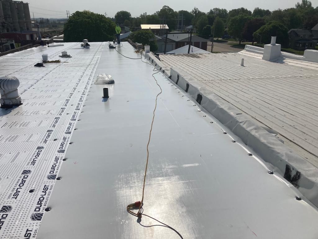 Recover of a downtown building  by Grell Roofing, LLC