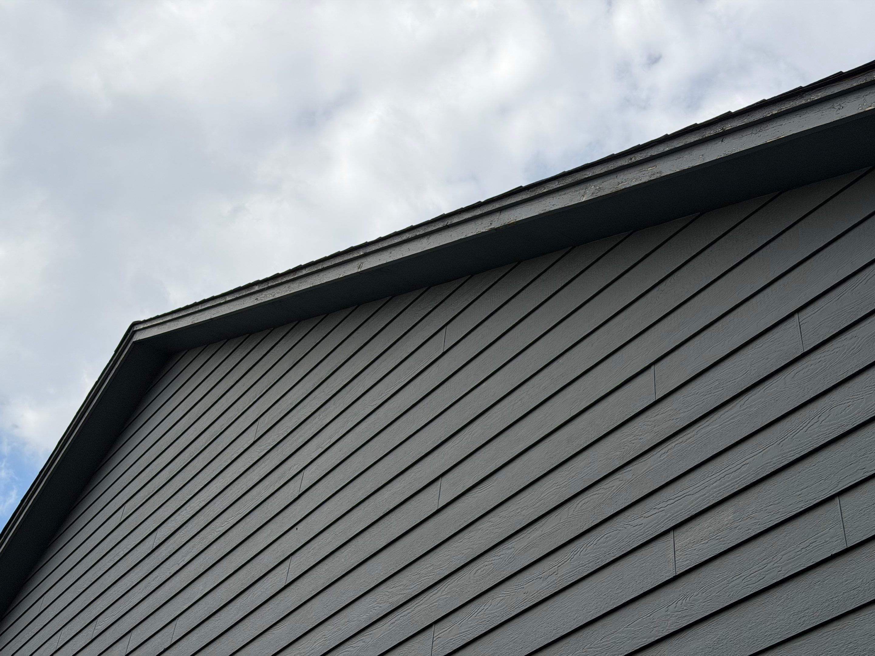Full Exterior Painting for Gray Siding and Trim in Sioux Falls by Select Painting, Coatings & Garage Cabinets