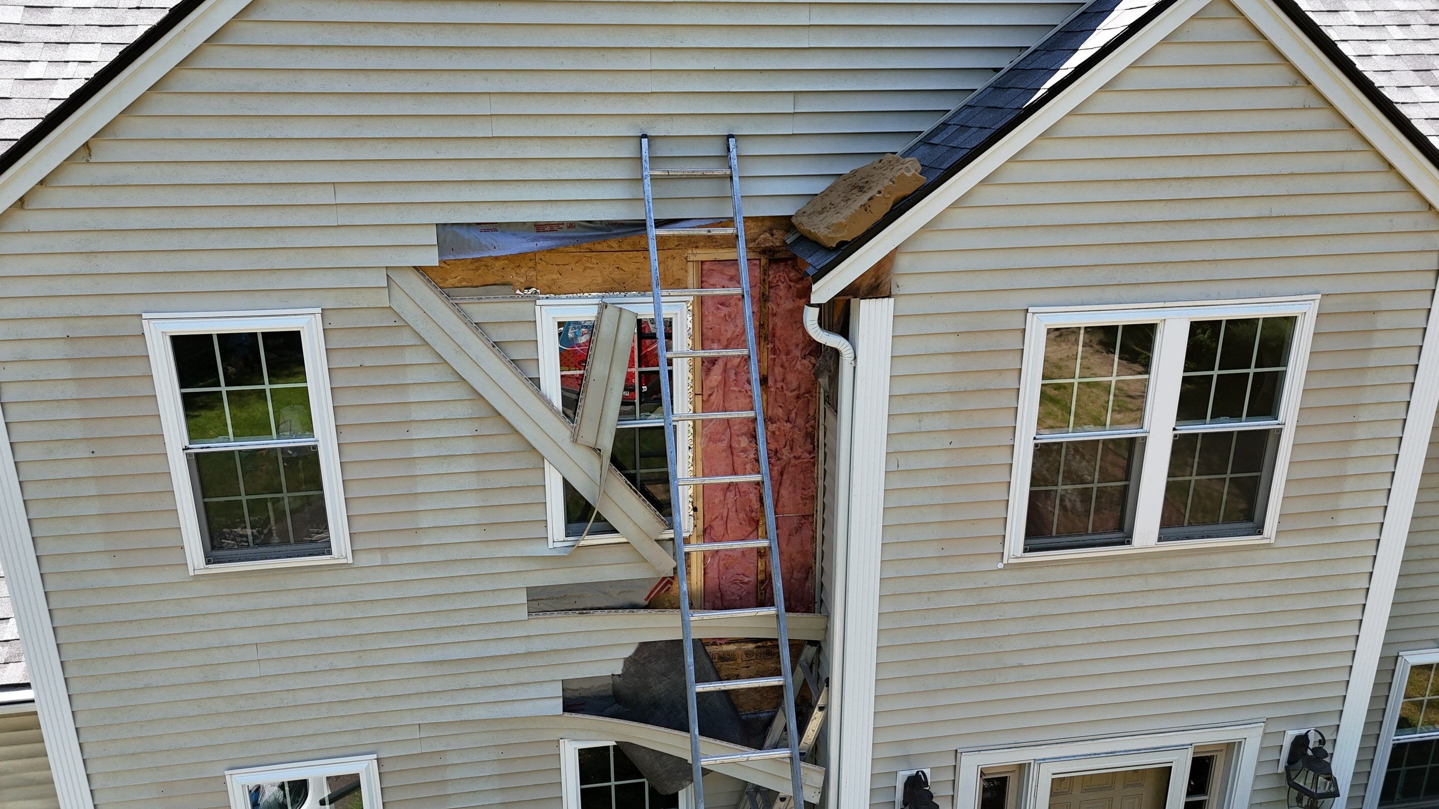 Leak Repair & Gutter Replacement in Chelmsford, MA by Mighty Dog Roofing of Greater Middlesex County