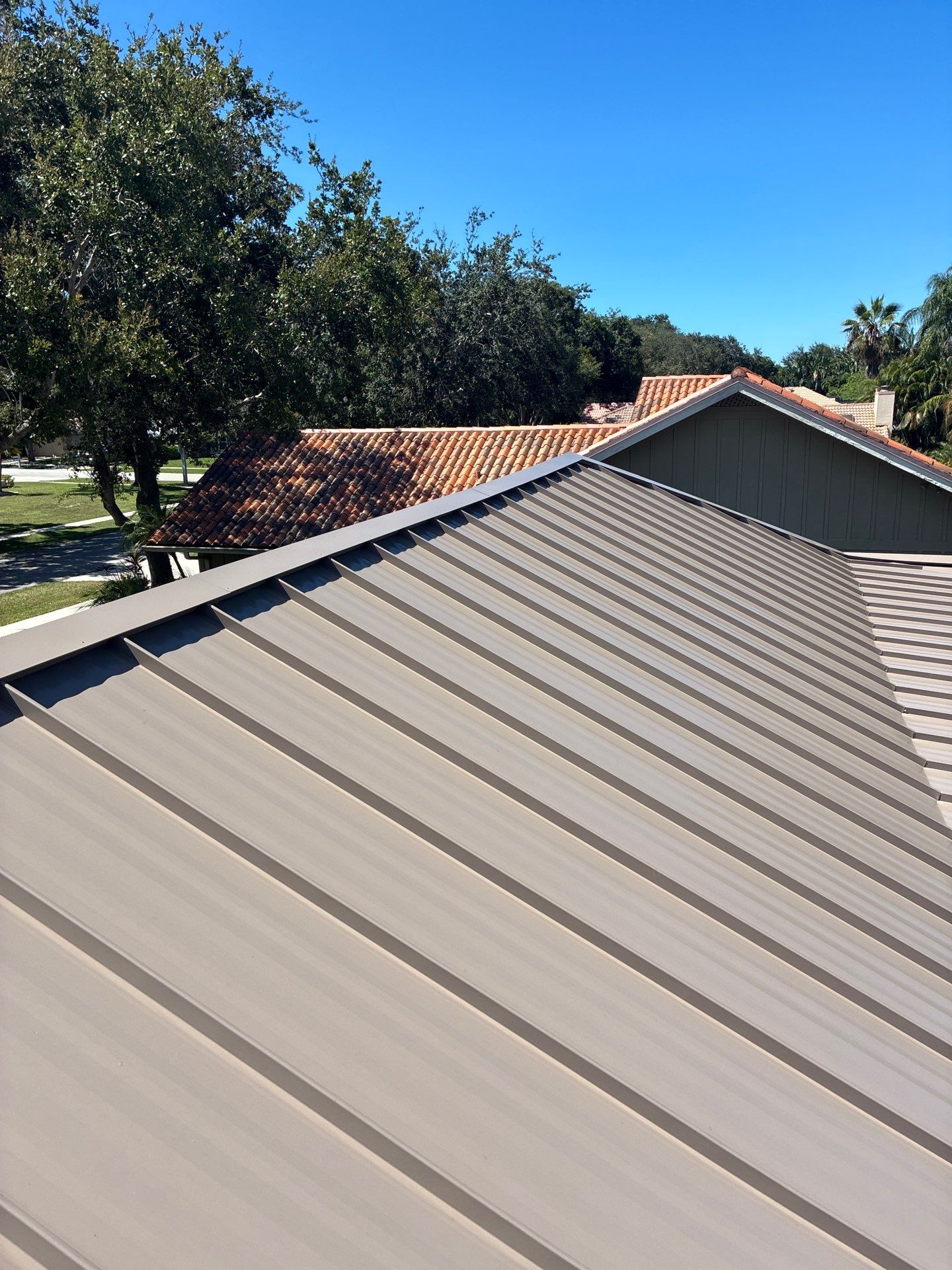 24ga 1.5" Mechanical Seam Buckskin  by Total Roofing System The Metal Roof Experts
