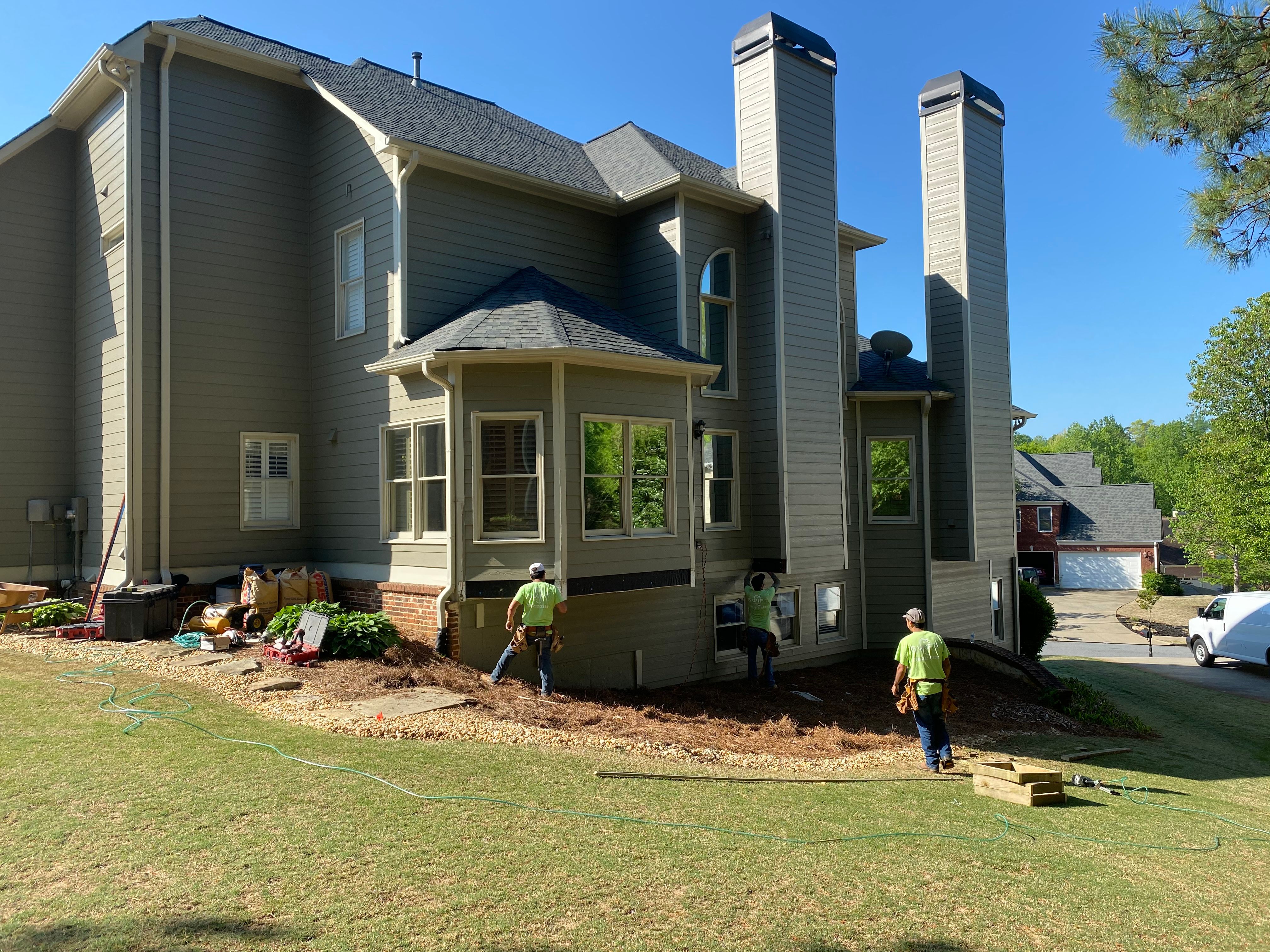 Covered Porch and Composite Deck Addition in Woodstock by Swift Home Renovations