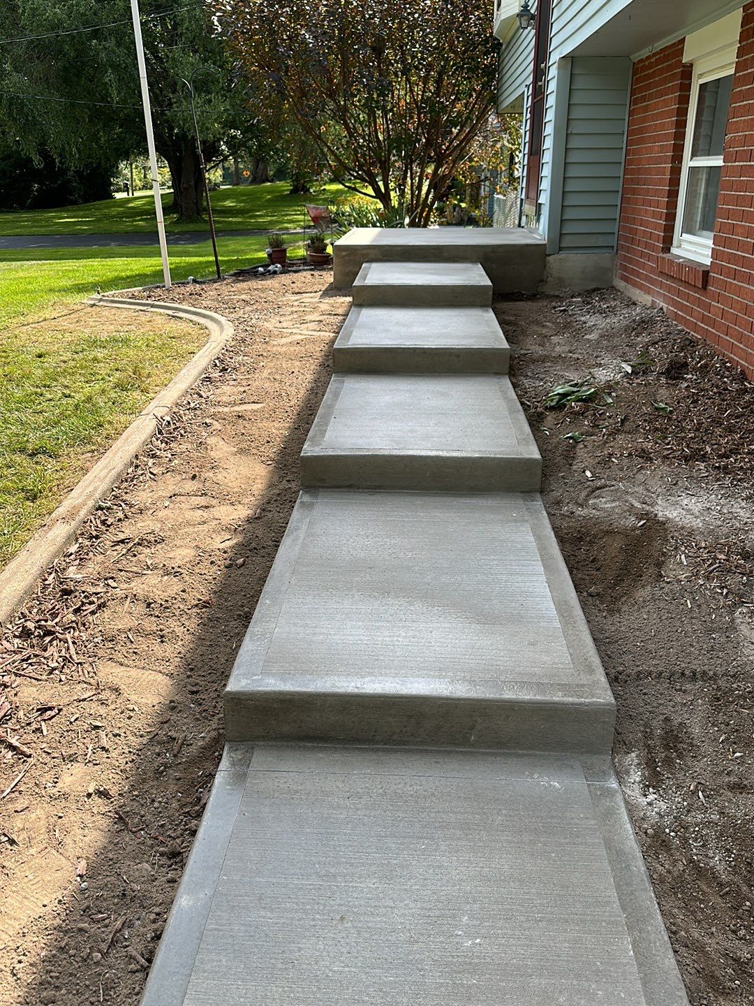 Steps with Broom Finish  by NG Masonry & Construction LLC