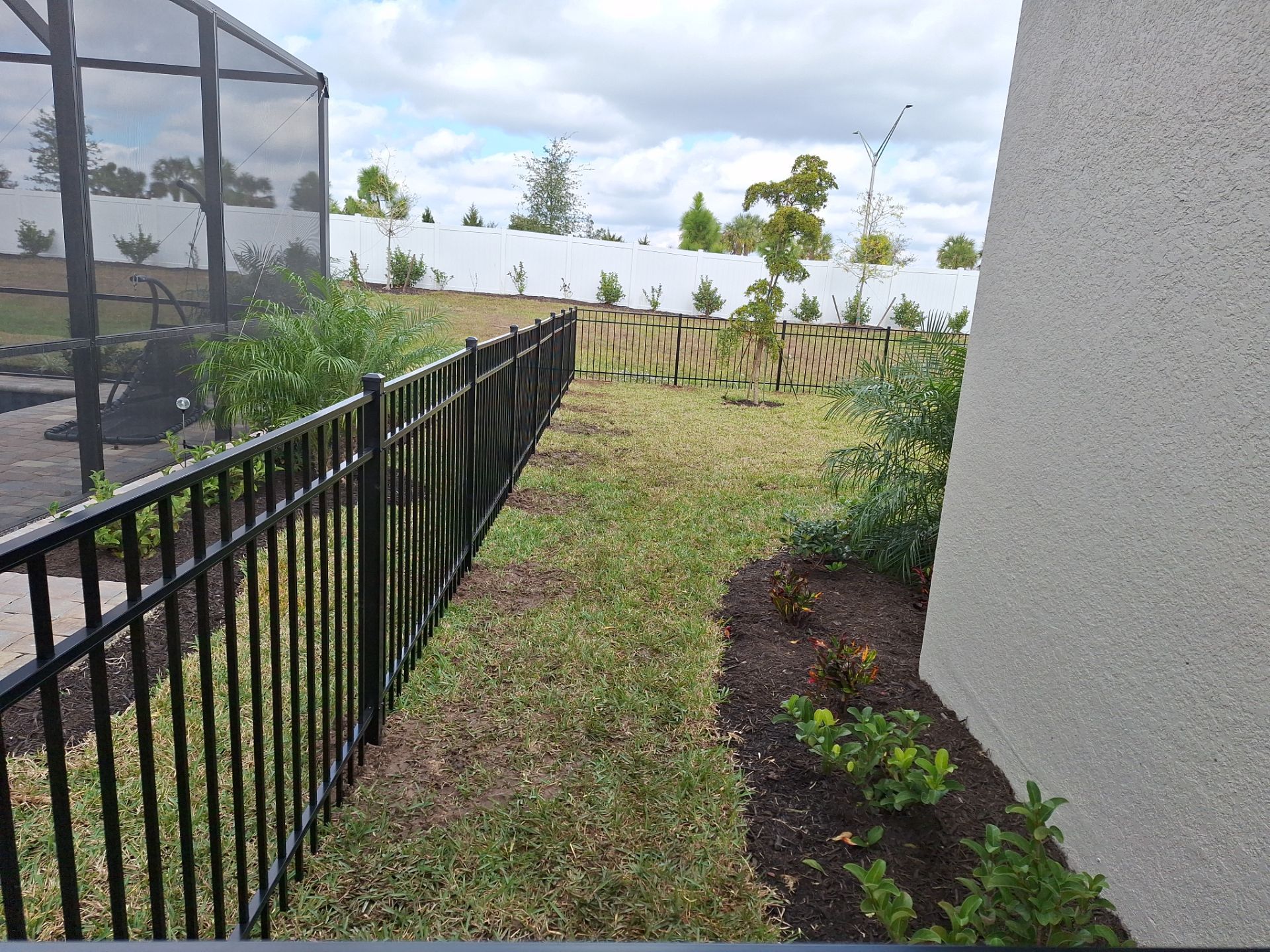 Aluminum Fence Installation using 4ft 3 Rail Black Aluminum Fence by Asap fence and gates, LLC