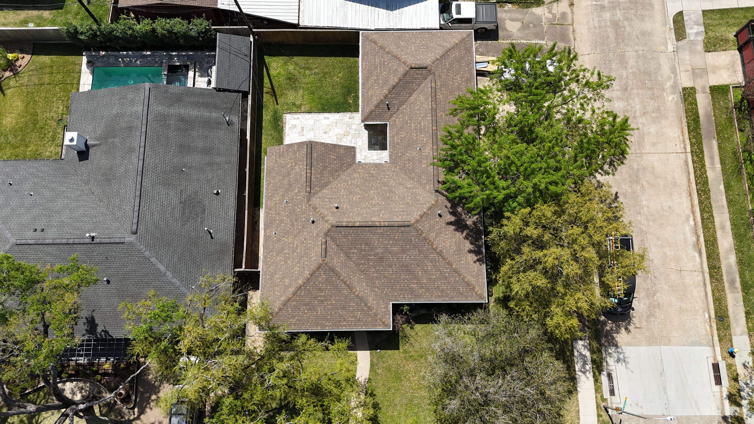 Insurance Roof Replacement in the Heights by Kainos Roofing & Exteriors