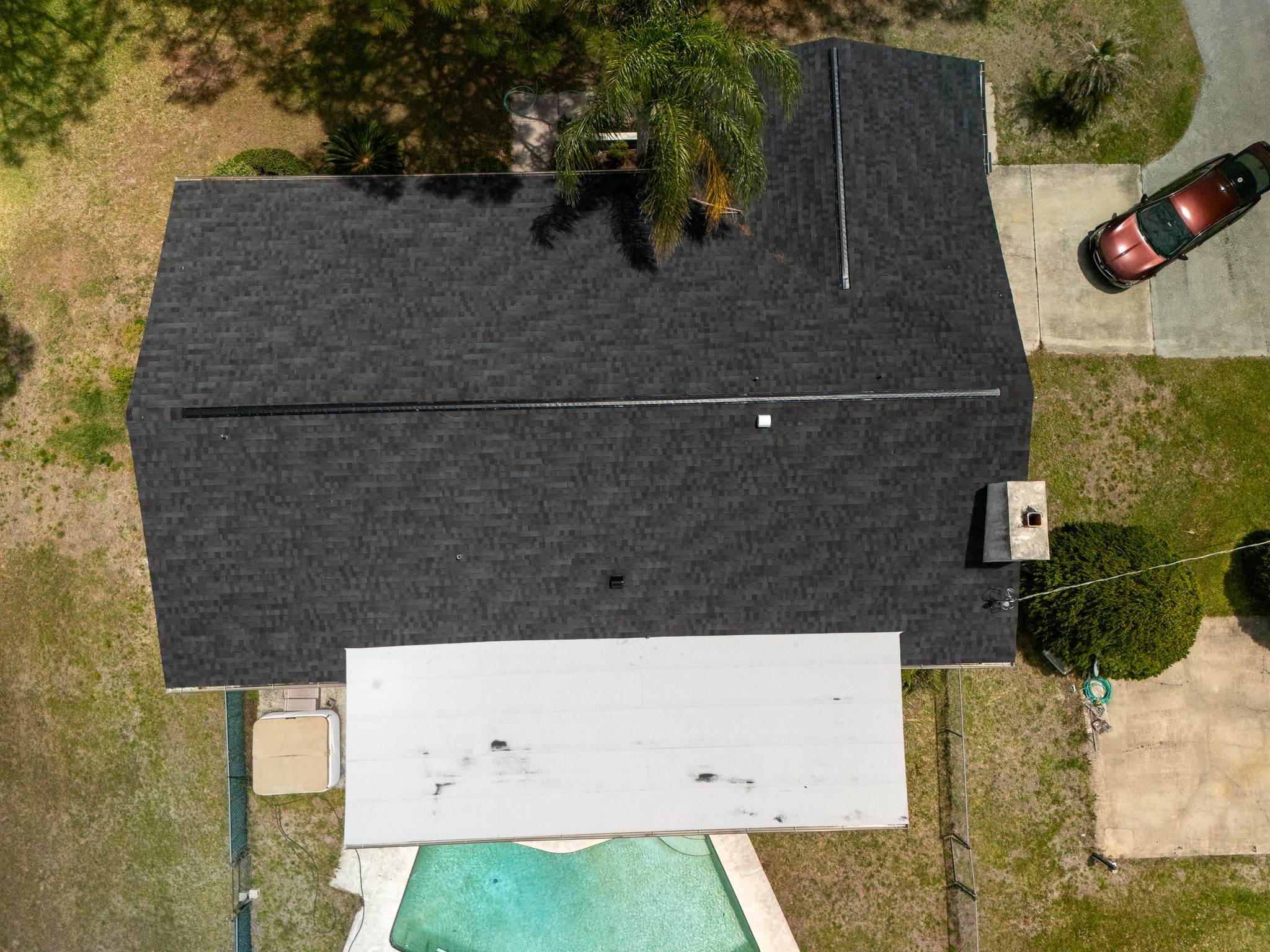 Architectural Shingle and Flat Roof Replacement in Malabar by Wiedmann Construction & Roofing