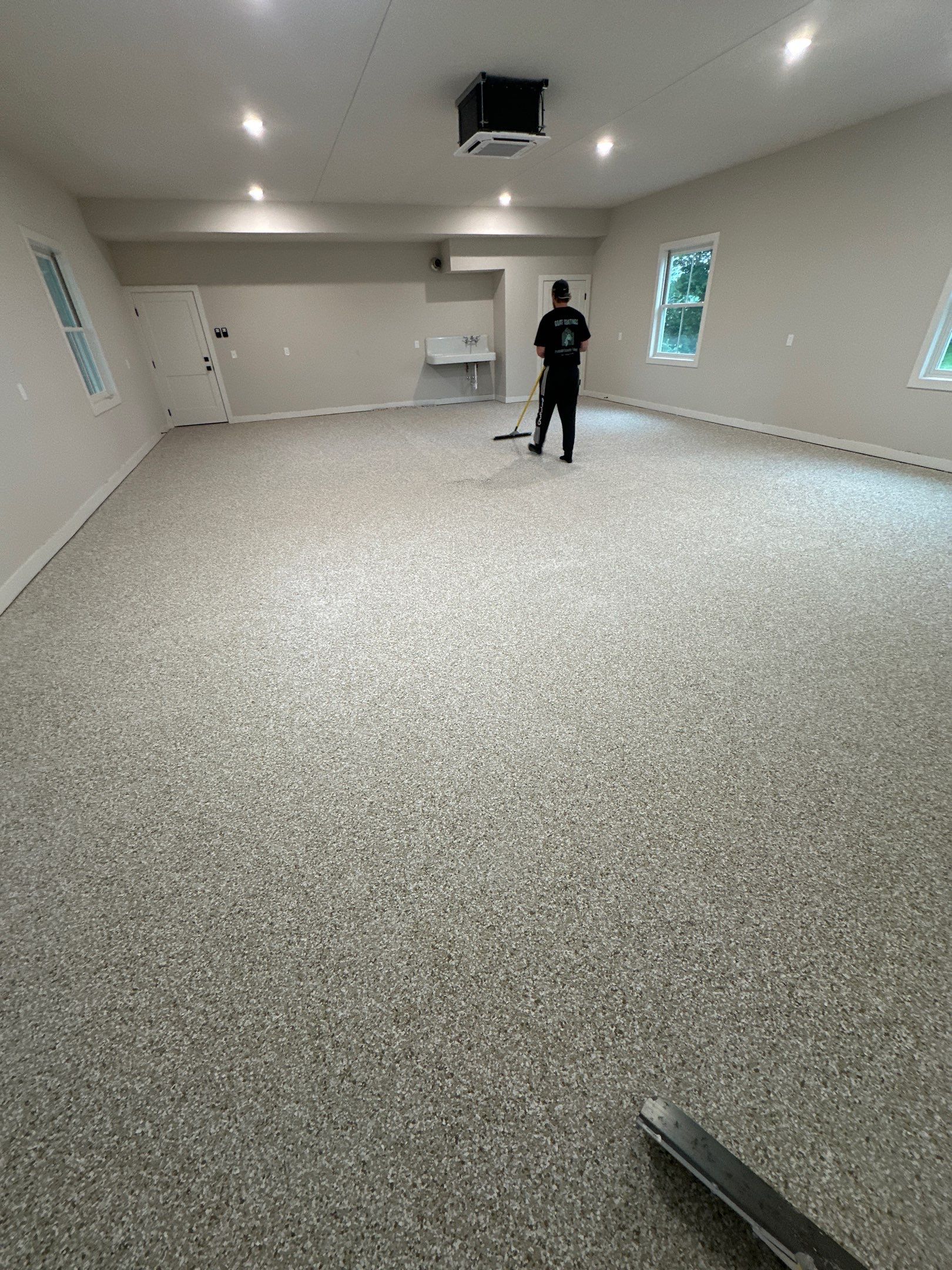 Trail Mix Epoxy Garage / Even Space by Goat Coatings
