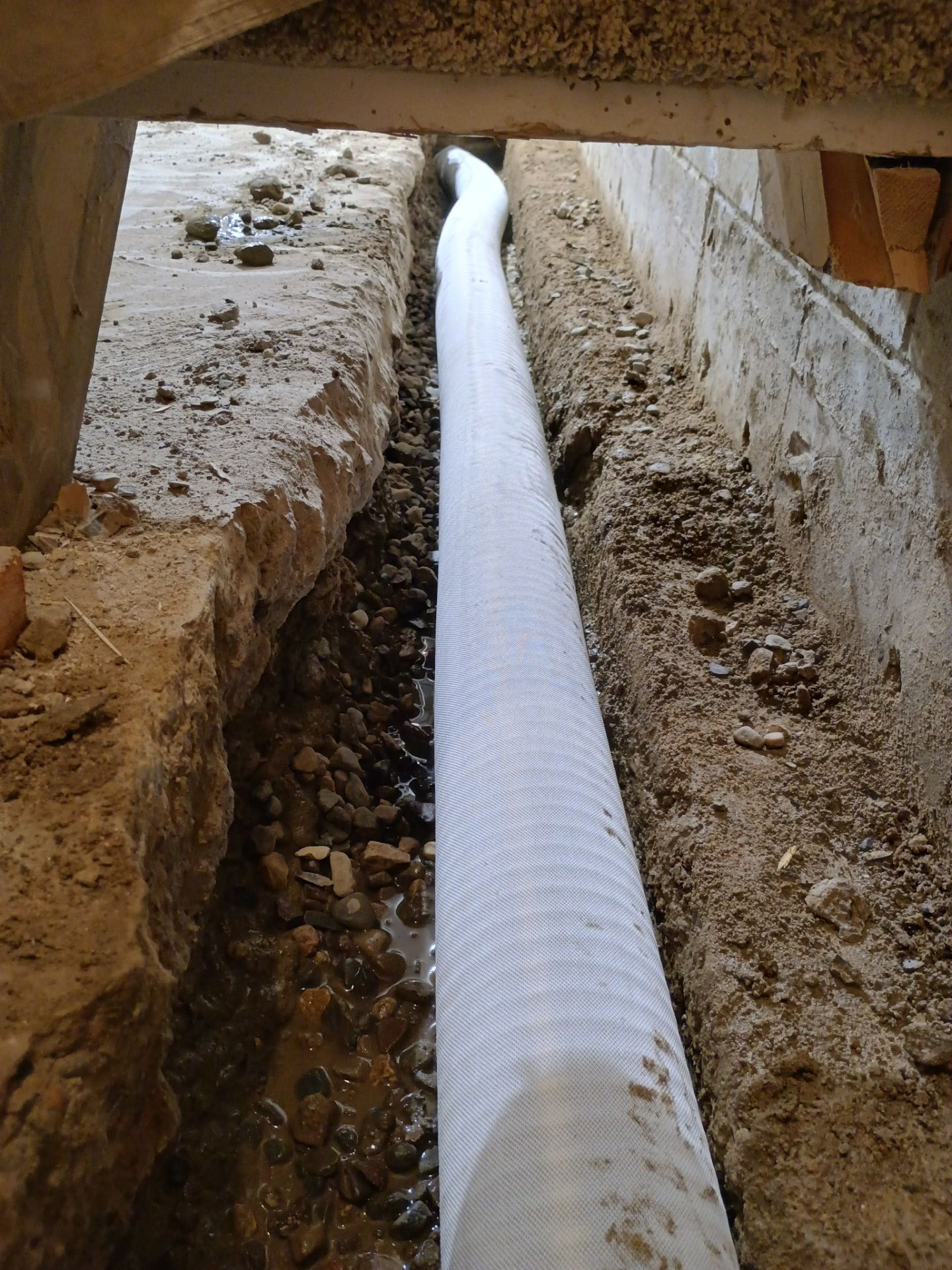 Interior Drain Tile Installation in Minnetonka, MN by Waterproofing Northeast