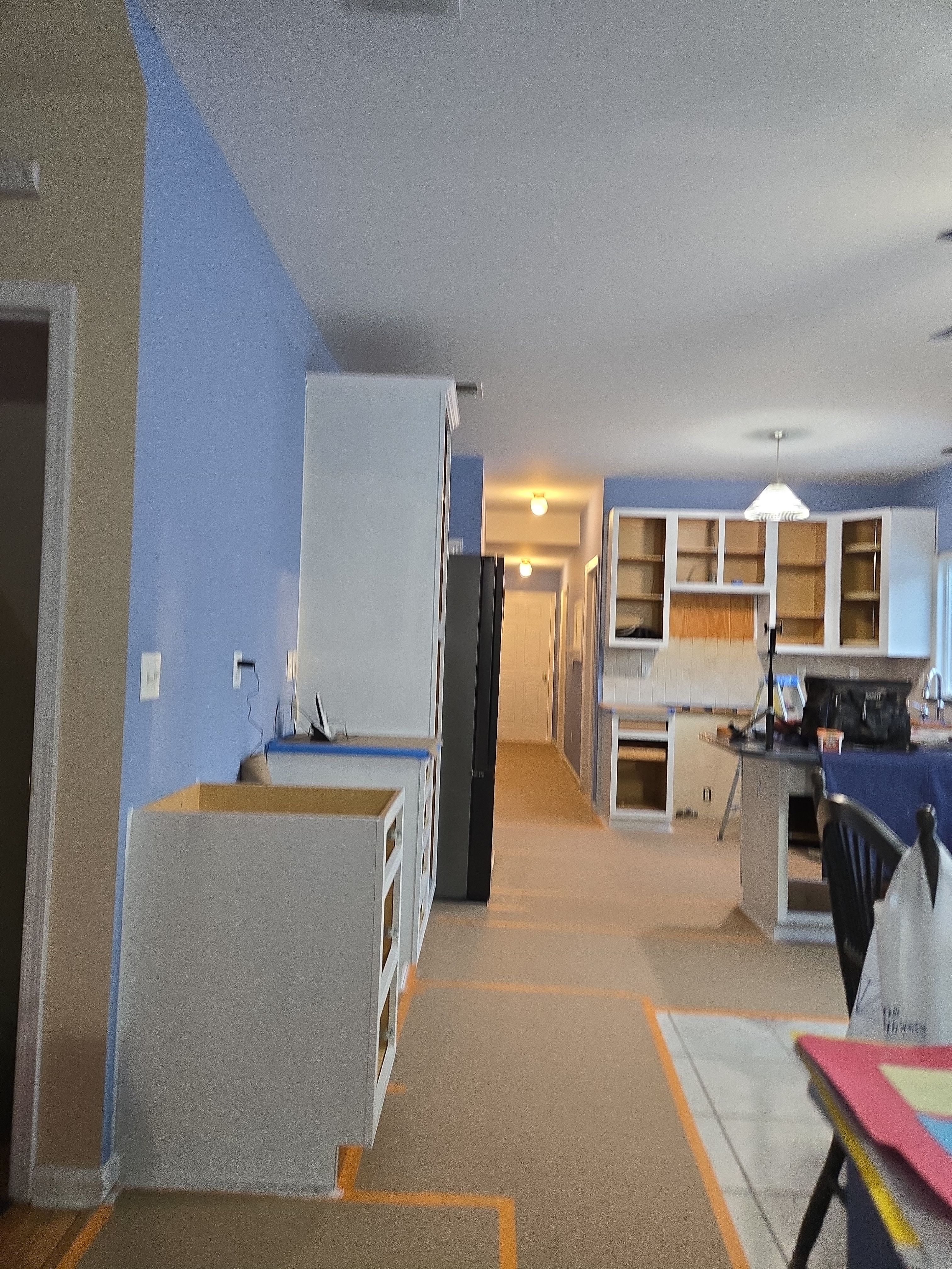 Cabinet Refinishing using Benjamin Moore Command by Spectrum Painting, LLC