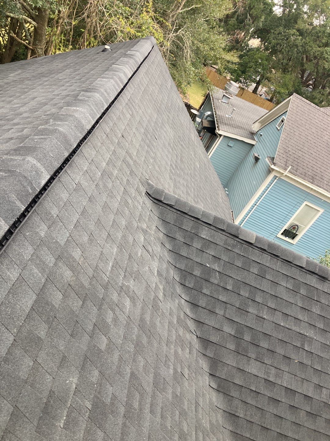 Residential Roofing Installation using Roof Replacement by American Roofing & Construction LLC
