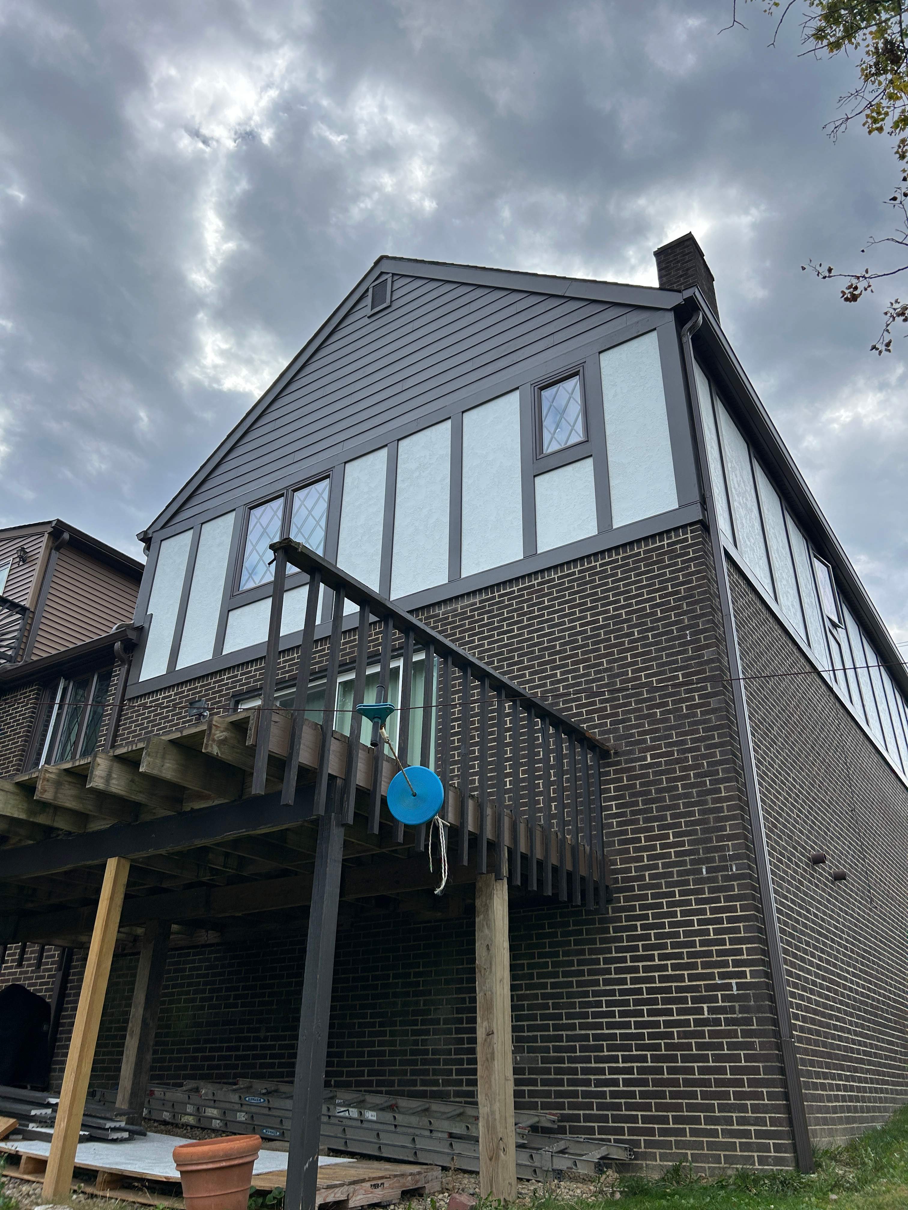 James Hardie Stucco Panel Tudor Remodel by Ideal Siding Pittsburgh