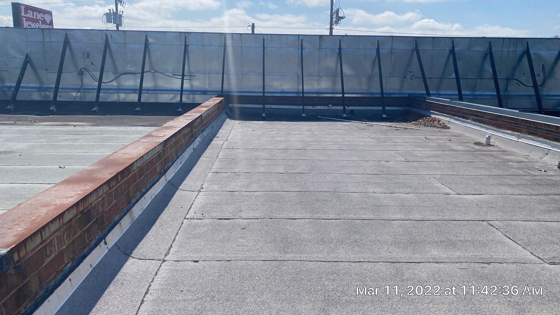 Commercial Roof Coating using Fiberseal basecoat and Silicon Topcoat by Just In Time Roofing and Restoration