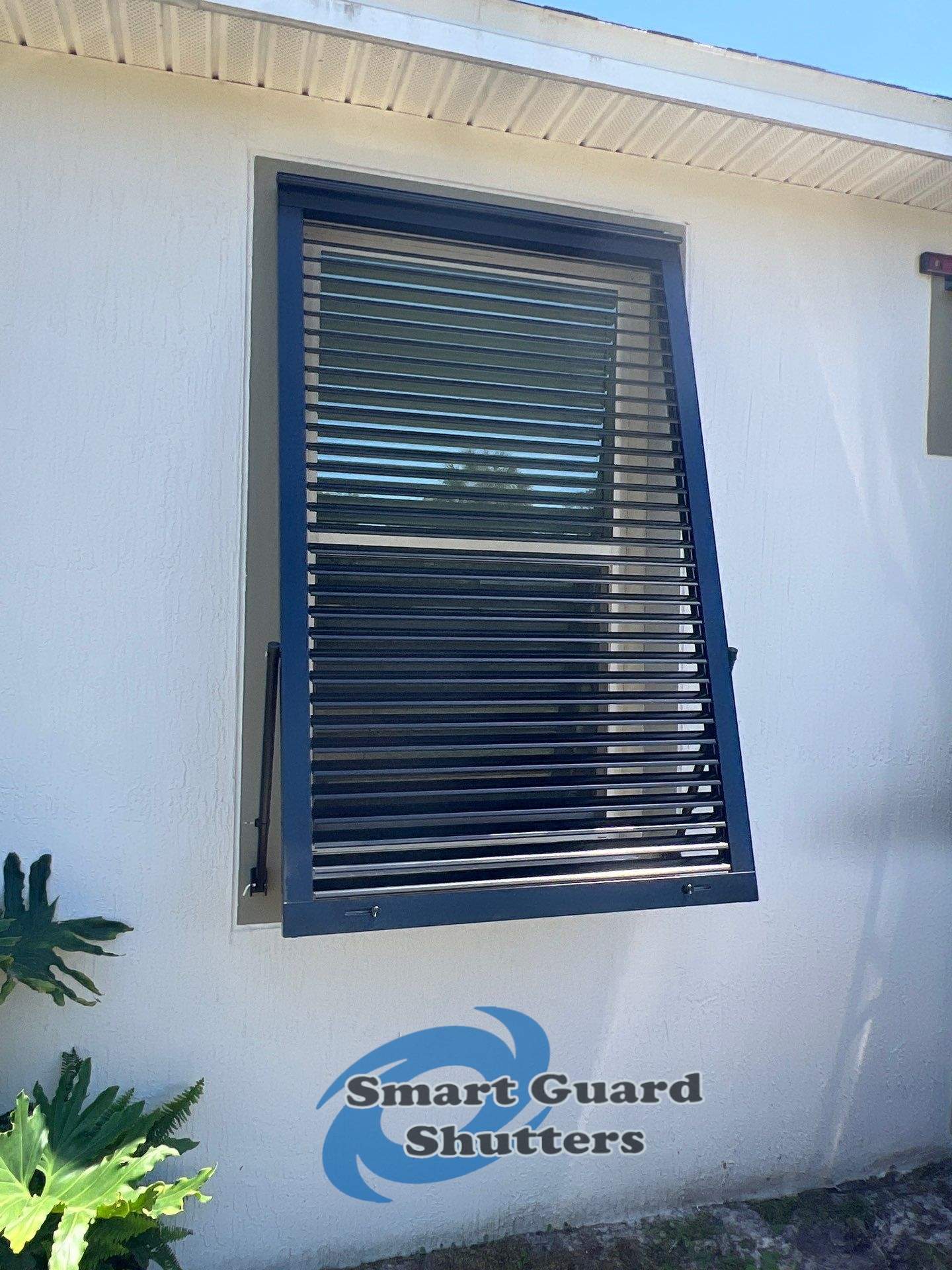 Impact Bahama Shutters in Jet Black MATTE by Smart Guard Shutters