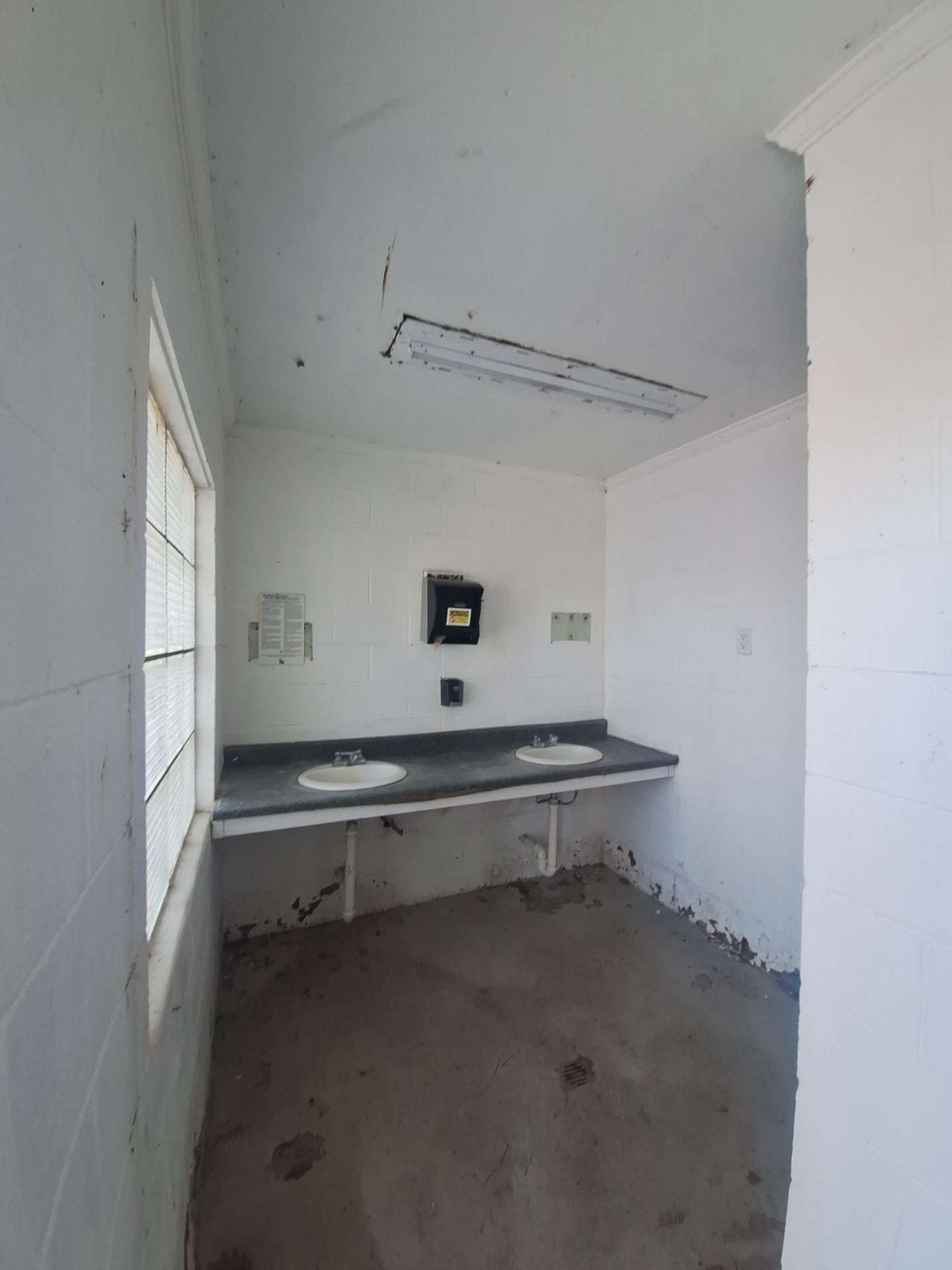 Bathroom Repaint & Epoxy Floor coating by Gordon Painting