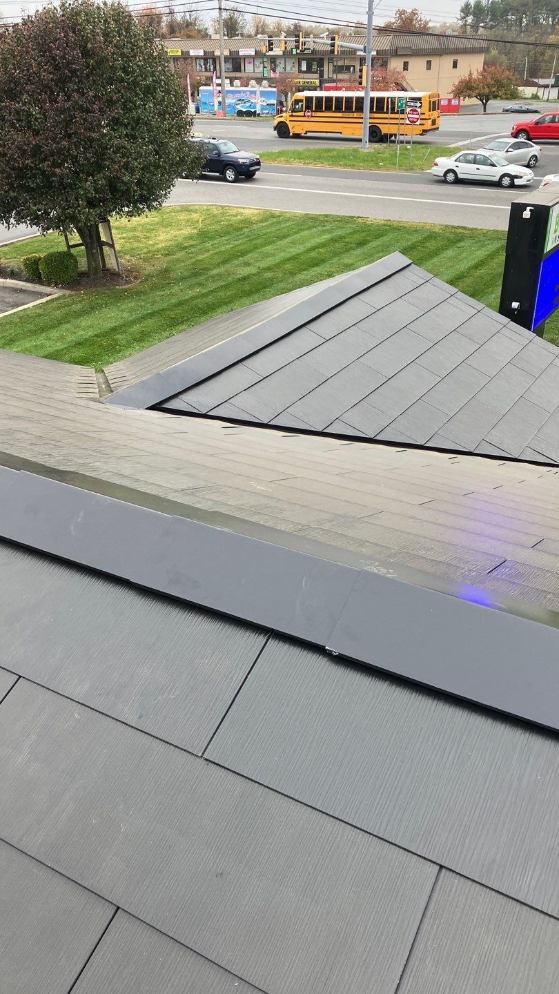 Tesla Solar Roof on a Commercial Building by American Home Contractors
