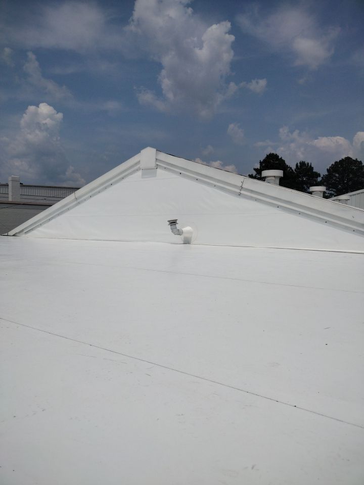 Office Building in Magnolia by Hostetler Roofing