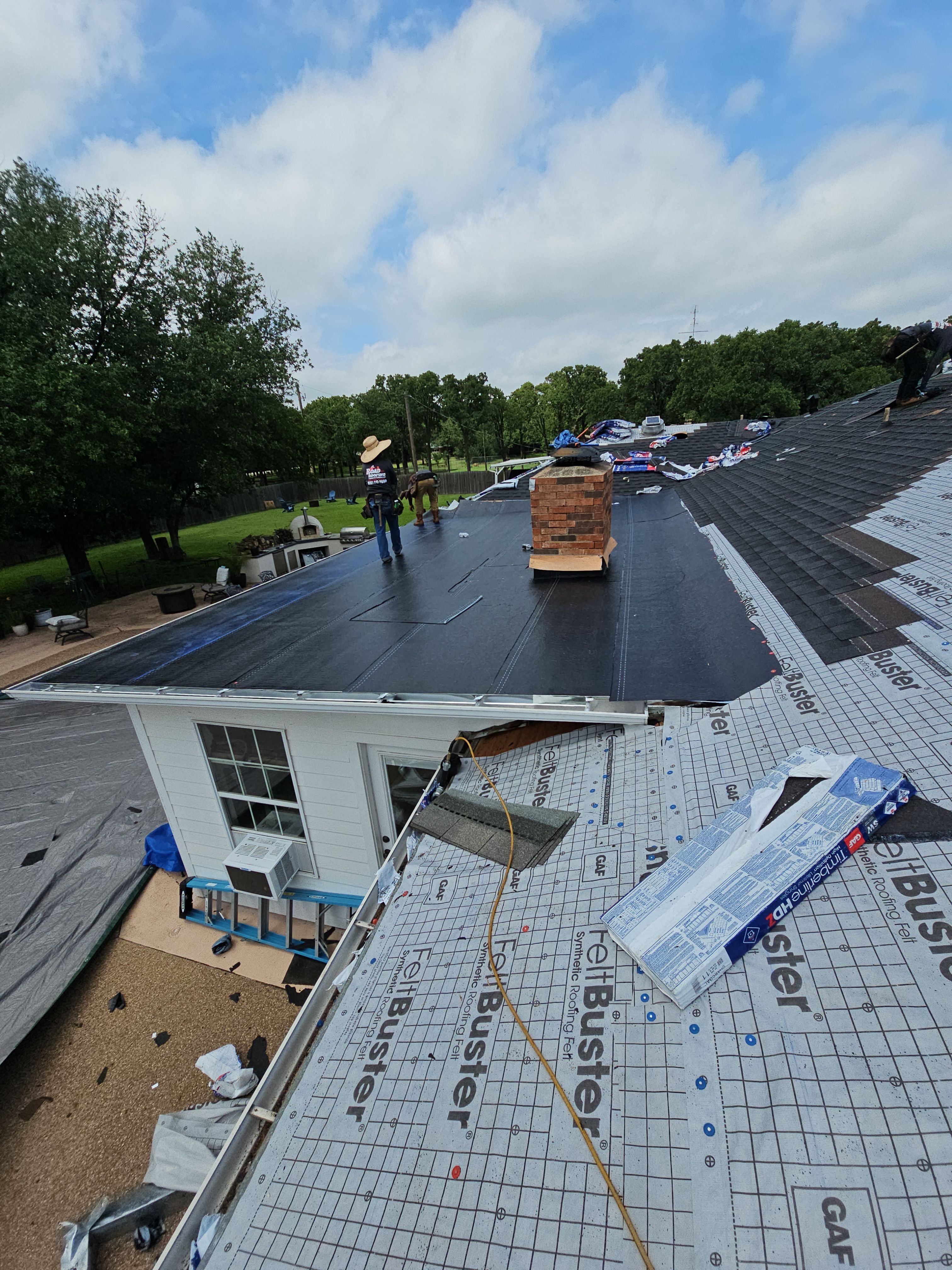 "Full Roof Replacement Due to Hail and Water Damage – Before & After" by road roofing llc