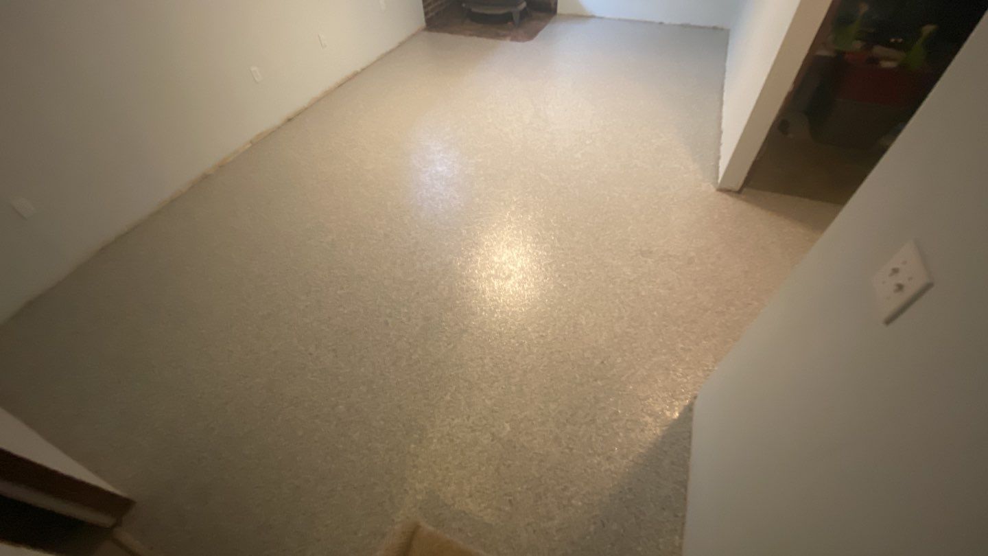 Basement using Tidalwave by Select Painting, Coatings & Garage Cabinets