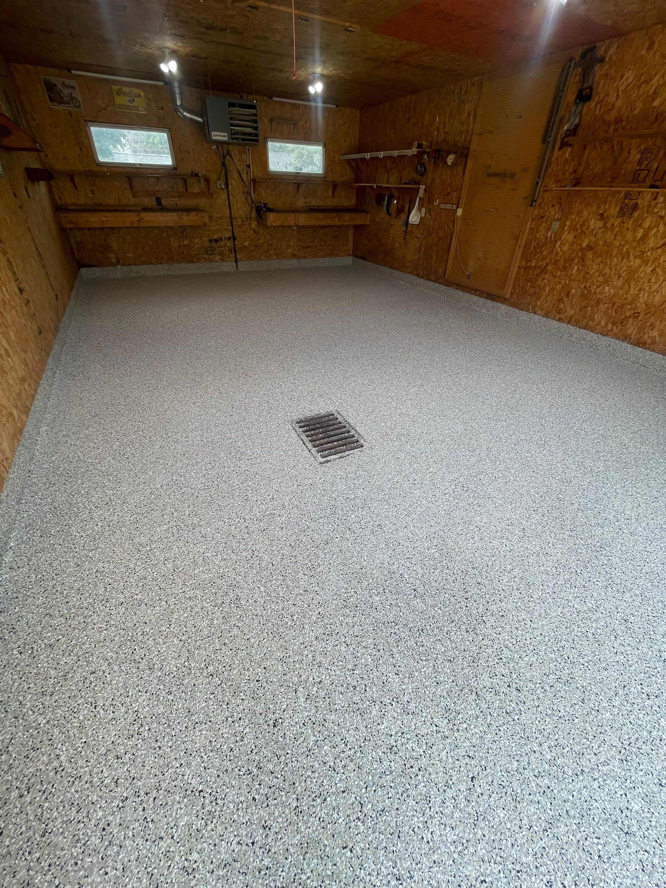 Speckled Epoxy Flake Concrete Coating for Worthington Garage Floor by Select Painting, Coatings & Garage Cabinets