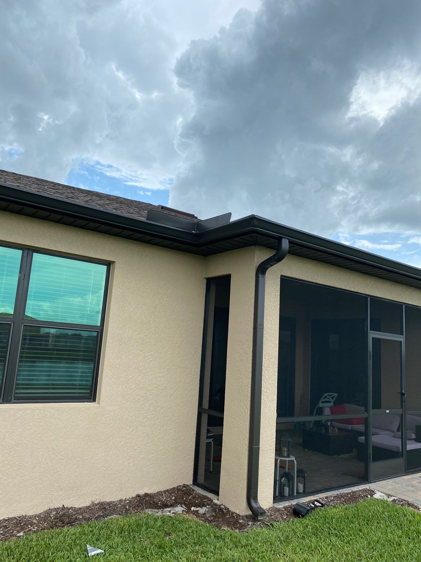 Brown Seamless Gutters for Homes in Fort Myers by Gutter Professors