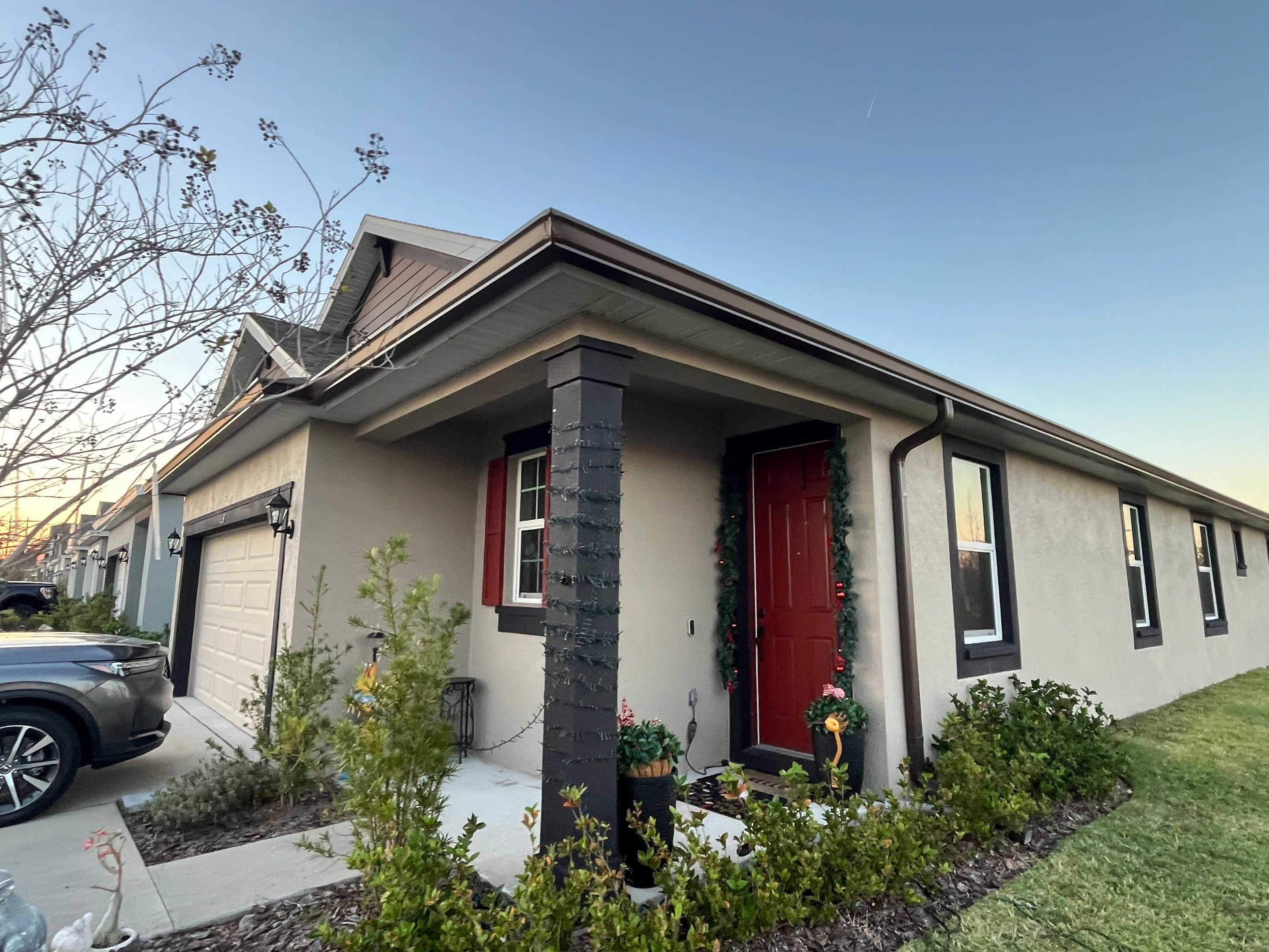 3X4 elbow Downspouts using Musket Brown Seamless Gutters in Lakeland FL by Gutter Professors