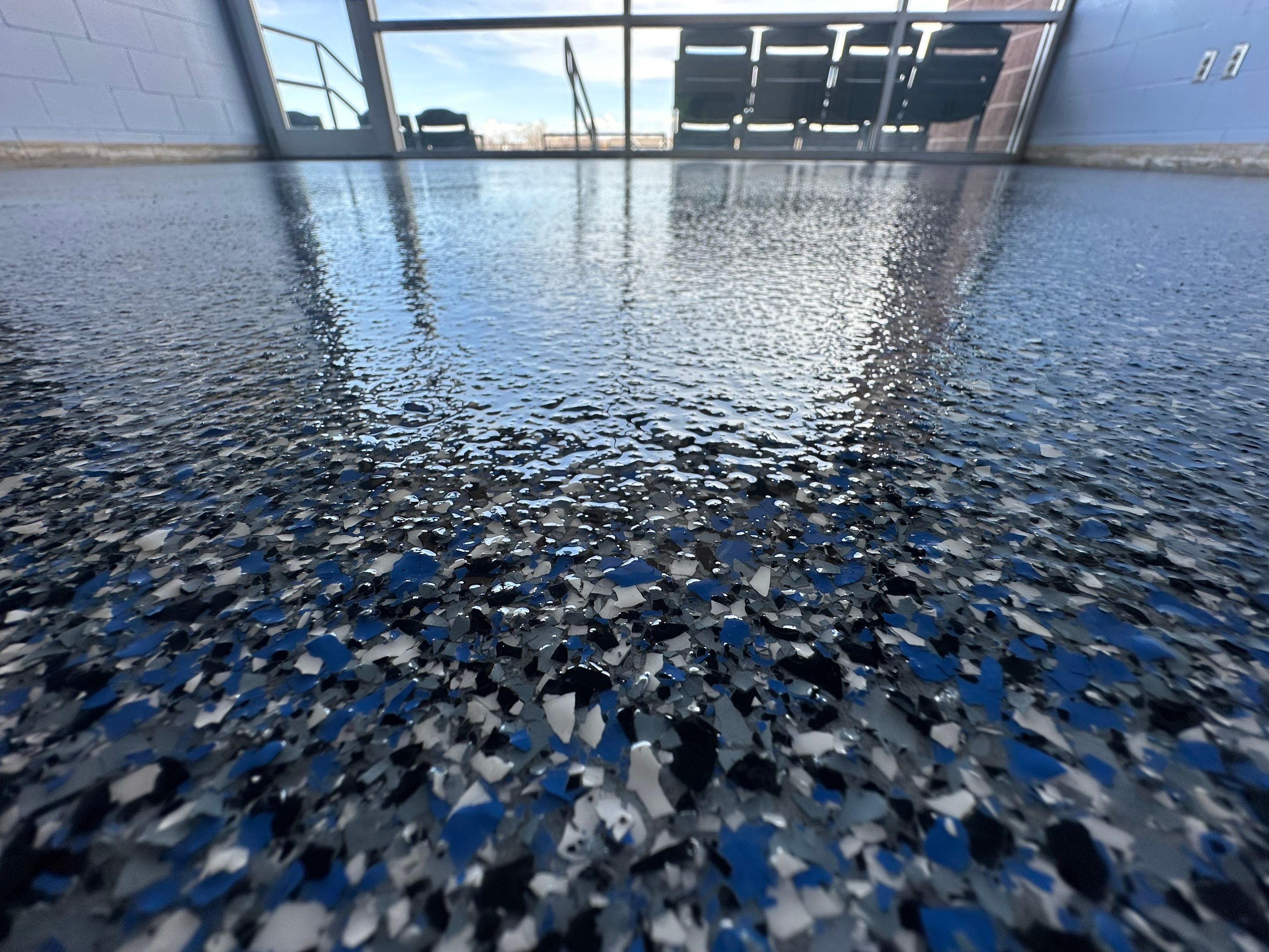 Commercial Epoxy Floor Coating for Stadium Viewing Suites in Sioux Falls by Select Painting, Coatings & Garage Cabinets