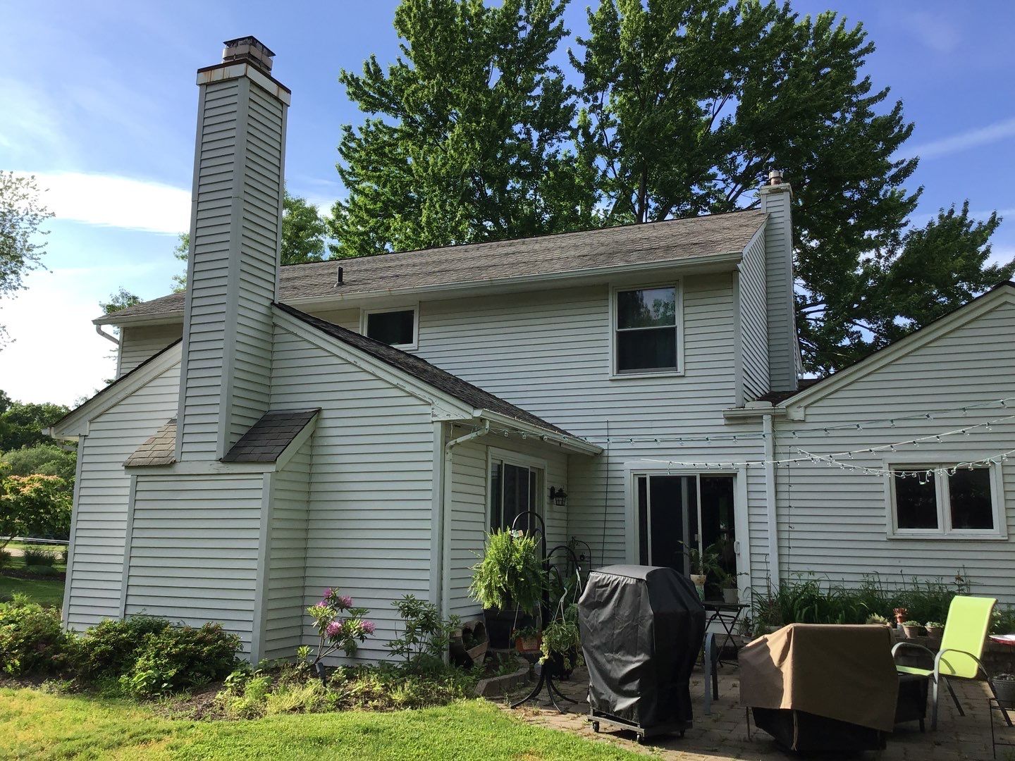 James Hardie Siding  using James Hardie Board and Batten, White by Absolute Roofing and Construction