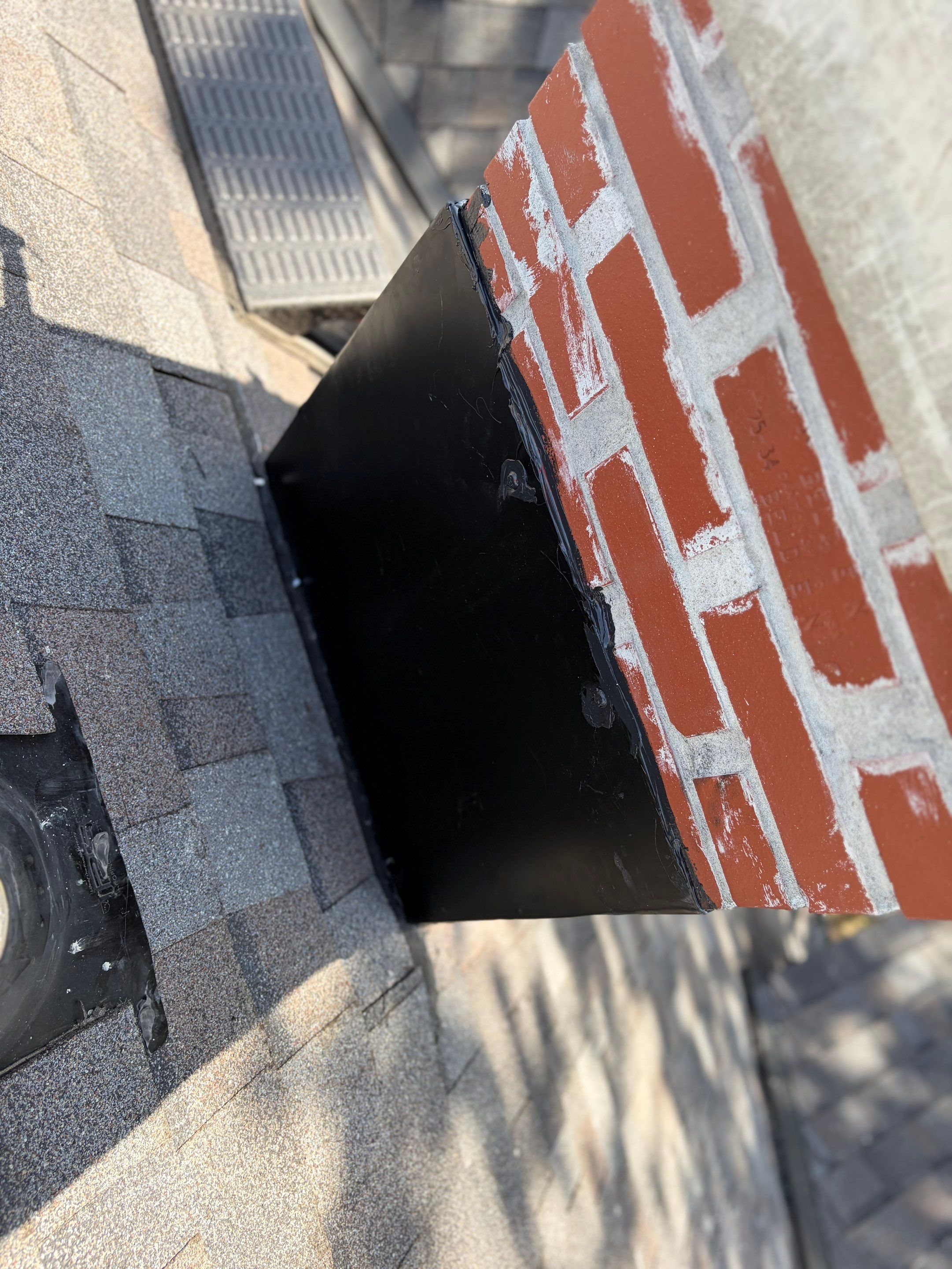 Brick Chimney Flashing and Roof Repair in Kansas City by Summit Roofing