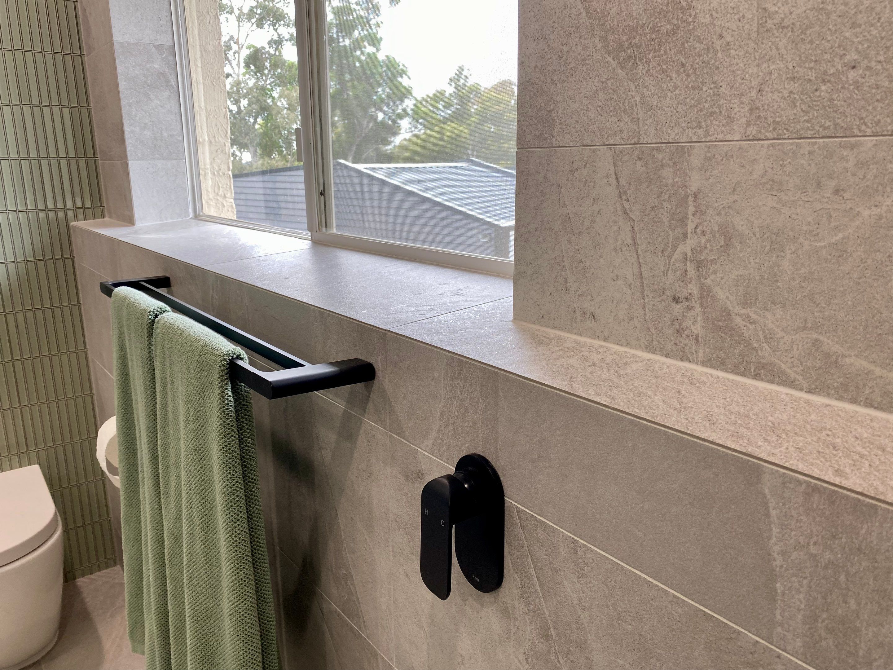 Bathroom Renovation using XROCK 36W White natural 300 x 600 by Re-seal Bathrooms