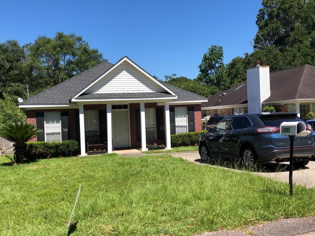 Residential Roofing Installation using Roof Replacement by American Roofing & Construction LLC