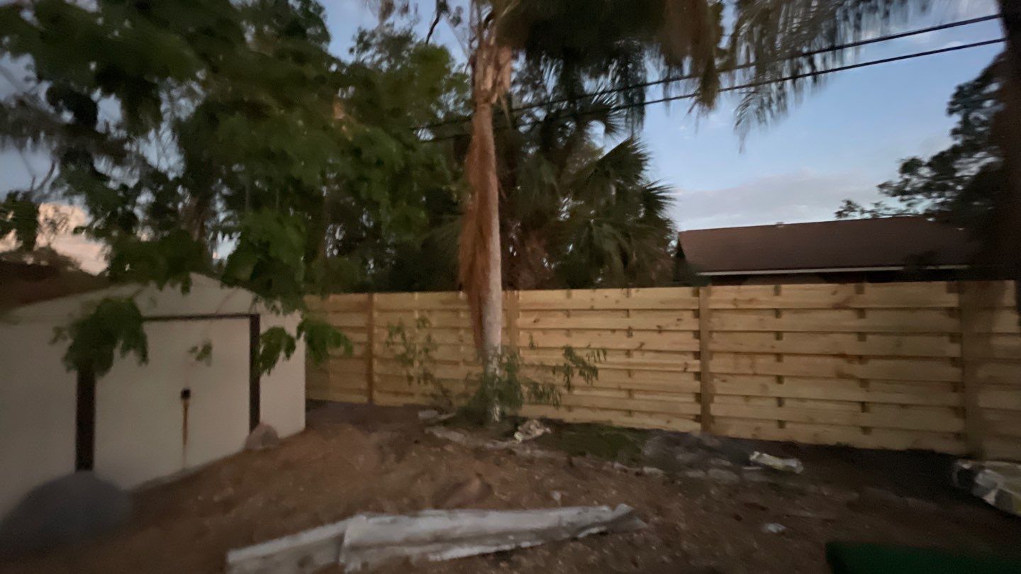 Wood Fence Installation using Horizontal Shadowbox Wood Privacy Fence by Asap fence and gates, LLC