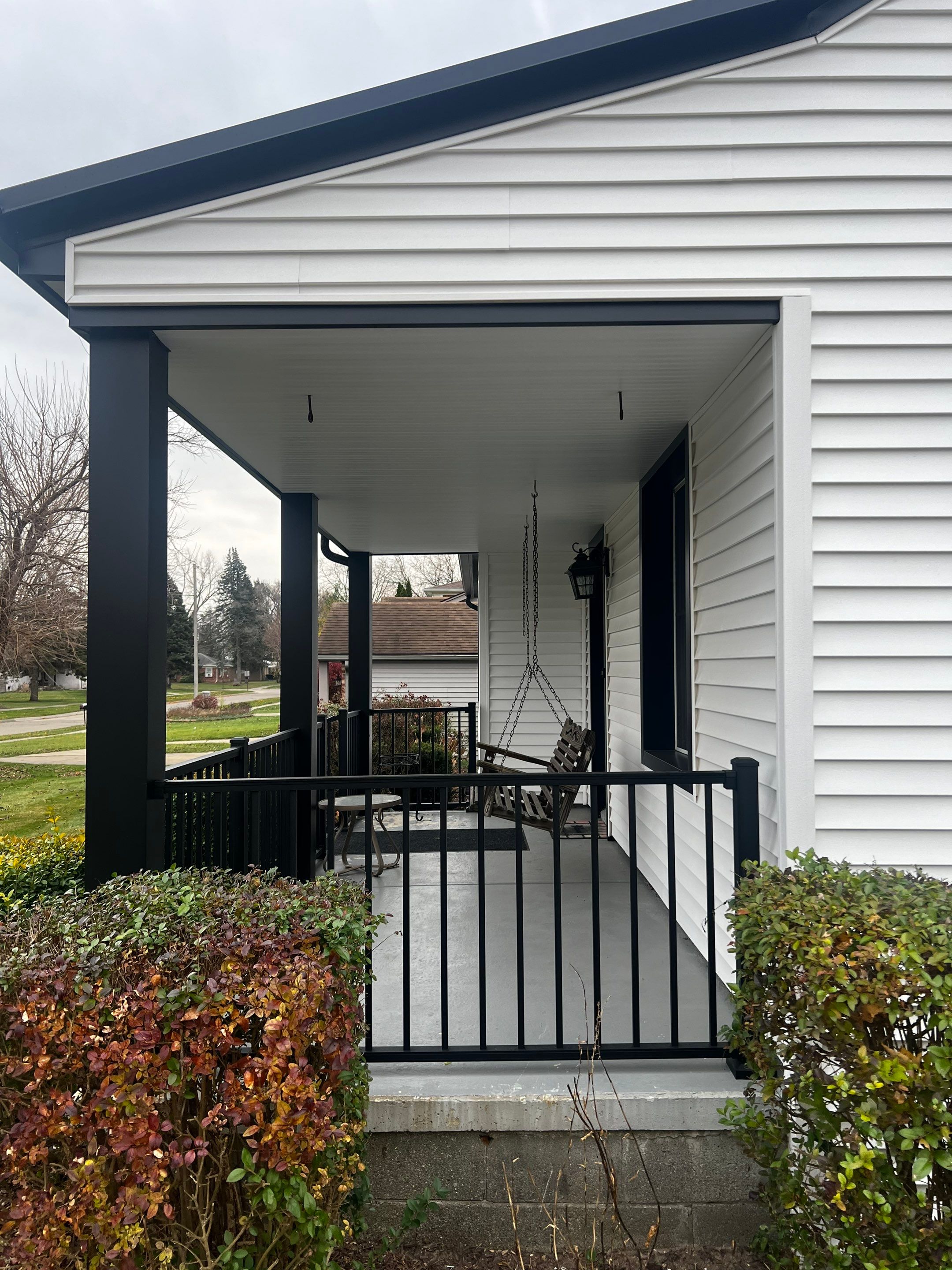 Siding Replacement using CertainTeed Monogram vinyl in Colonial White & Front Porch Remodel by Bloomfield Construction & Restoration
