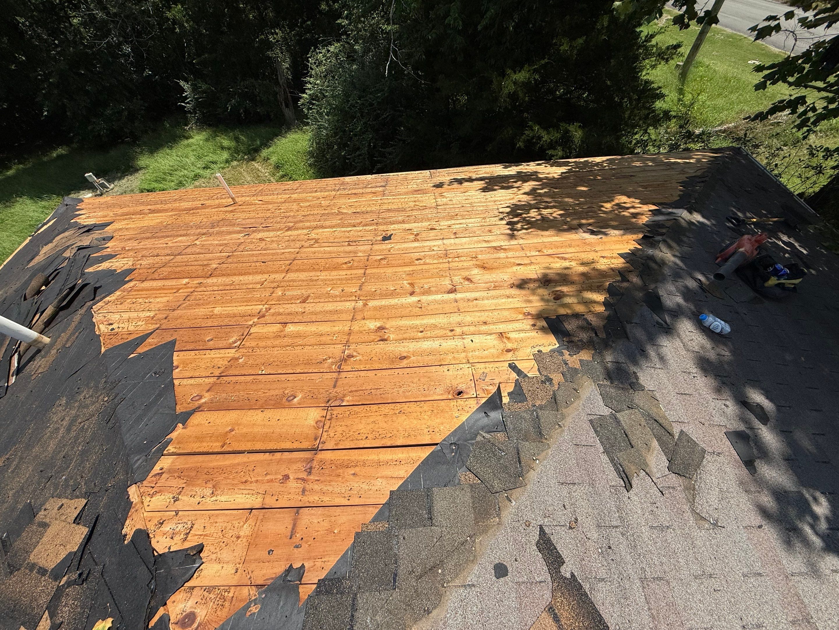 2 layers tear off & installation of new architectural shingles. by In & Out Construction & Remodeling, LLC