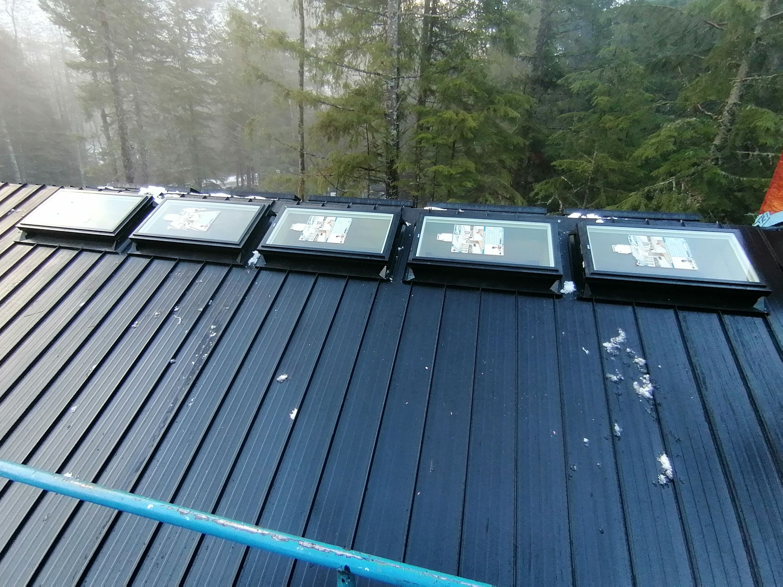 Residential Roofing Installation using 12" Prolok metal  by Top Notch Roofing Inc