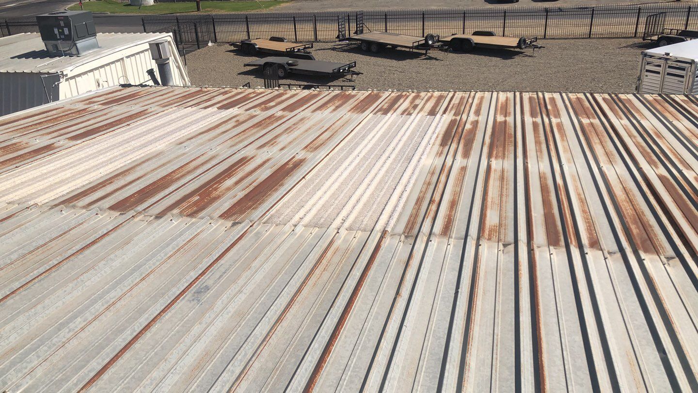 Metal Restoration Roofing system with Benchmark/PUMA XL 20 yr warranty by Straight Edge Roofing Inc