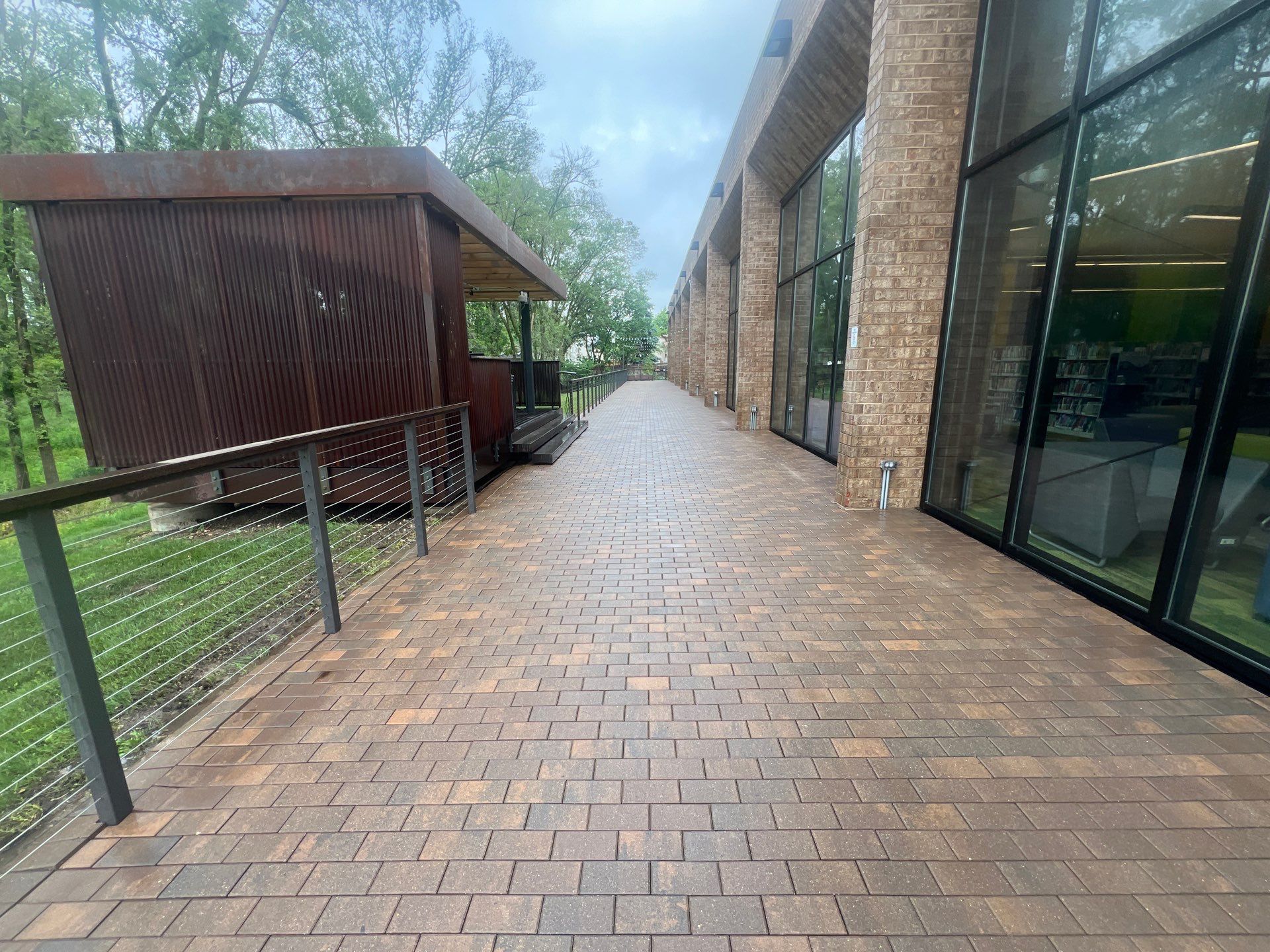 Brick paver repair, cleaning, sealing and poly sanding by Northern Power Washing LLC.