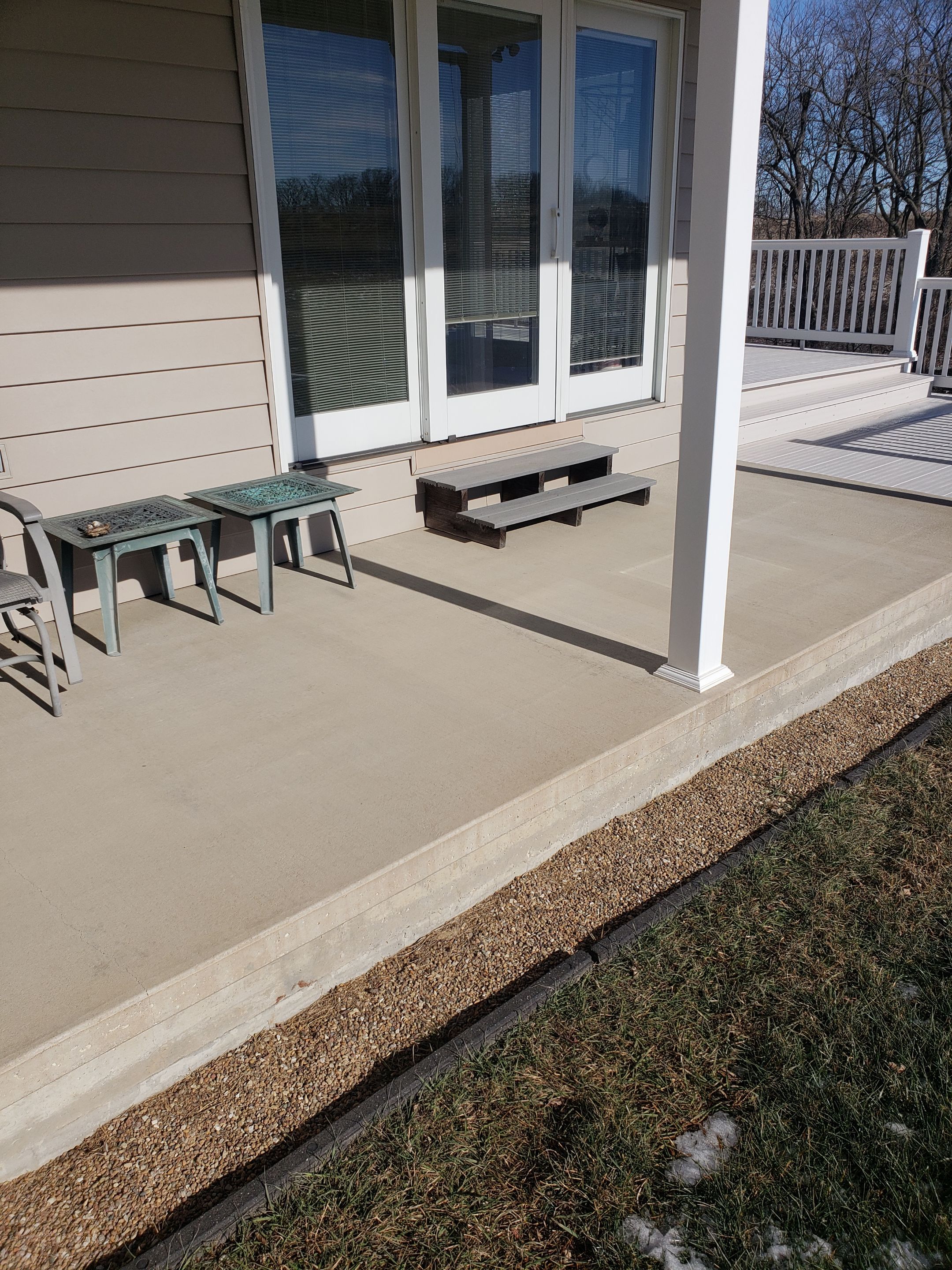 St. Joseph -- Front Patio and Garage Epoxy Garage Coating System by Big Red Decorative Concrete, LLC