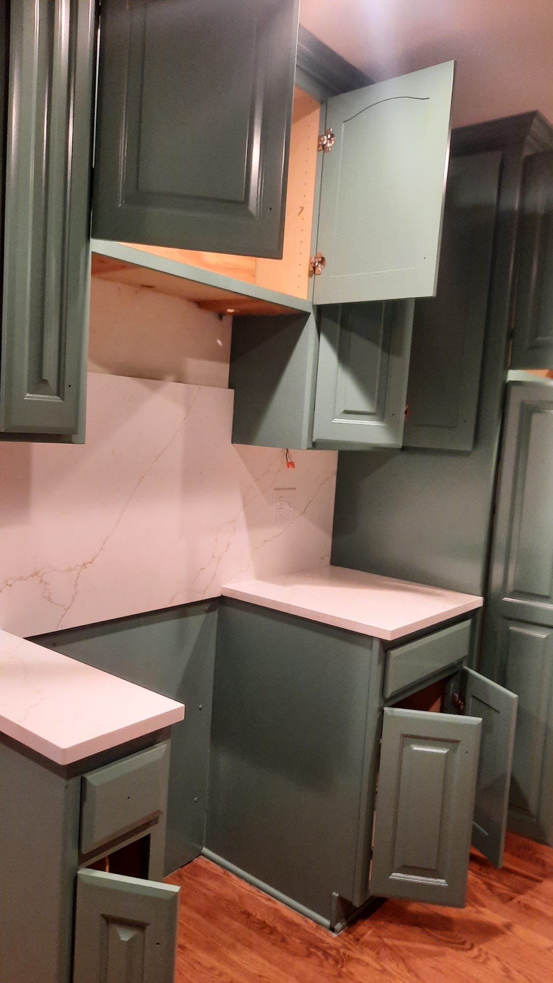 Elegant Transformation: Stained Cabinets Revamped with Sherwin-Williams Juniper by Cougar Painting