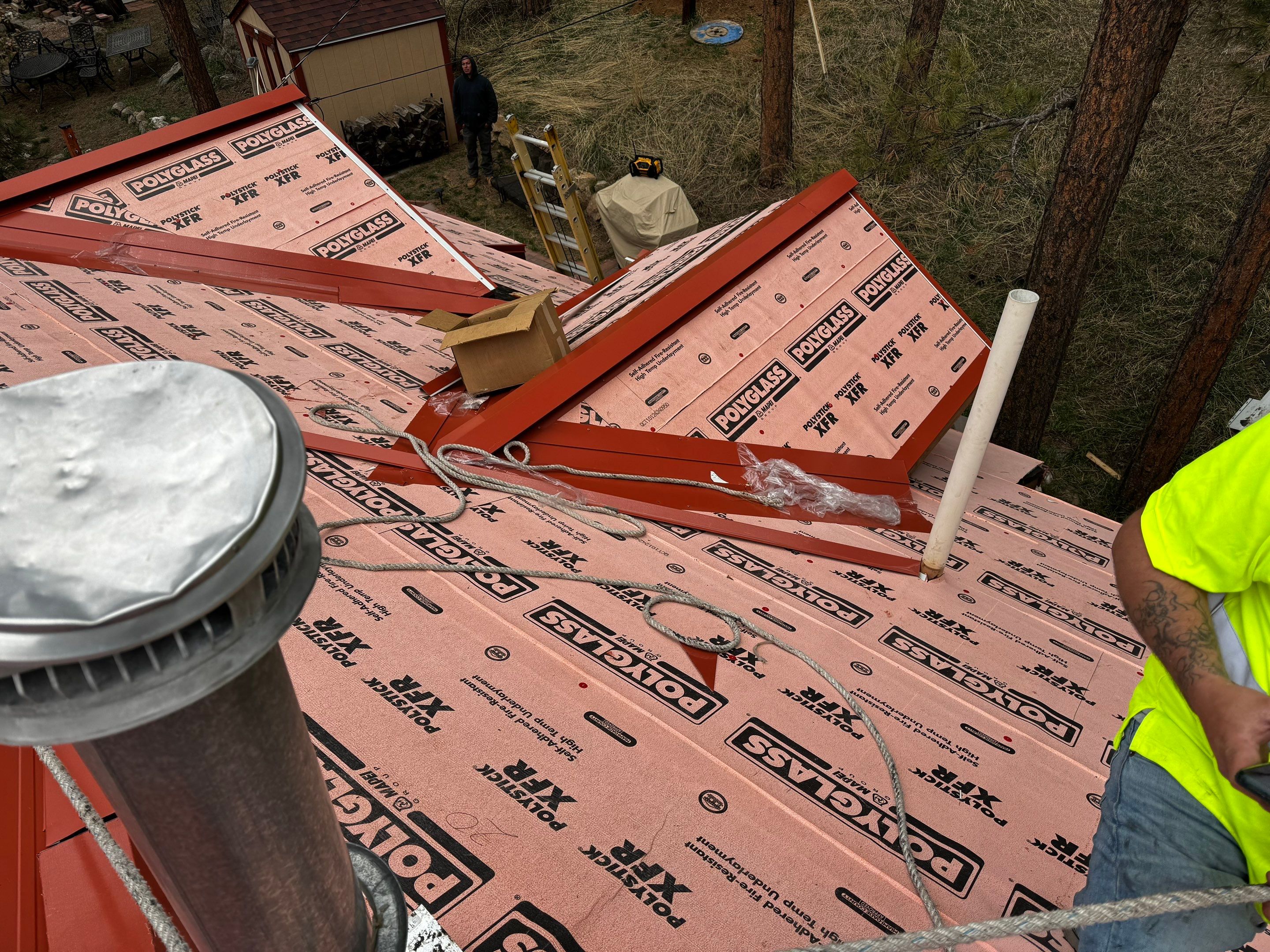 Residential Roofing Installation using Standing Seam Metal by Blue Peaks Roofing LLC 