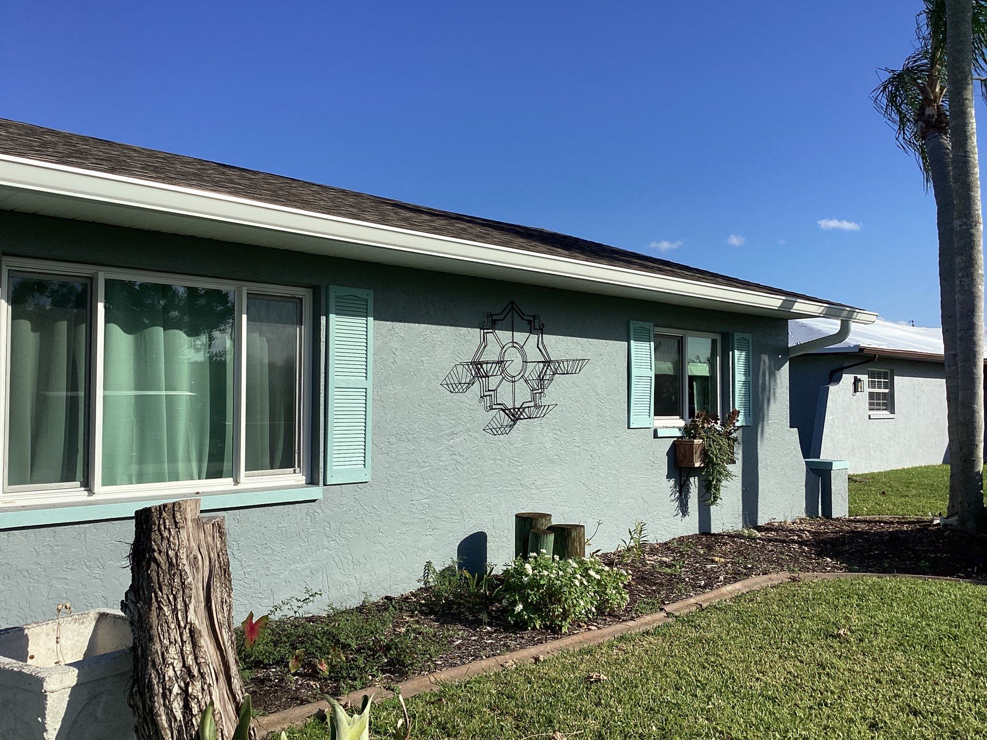 Soffit and Fascia Installation using White Vinyl Soffit in Cape Coral FL by Gutter Professors